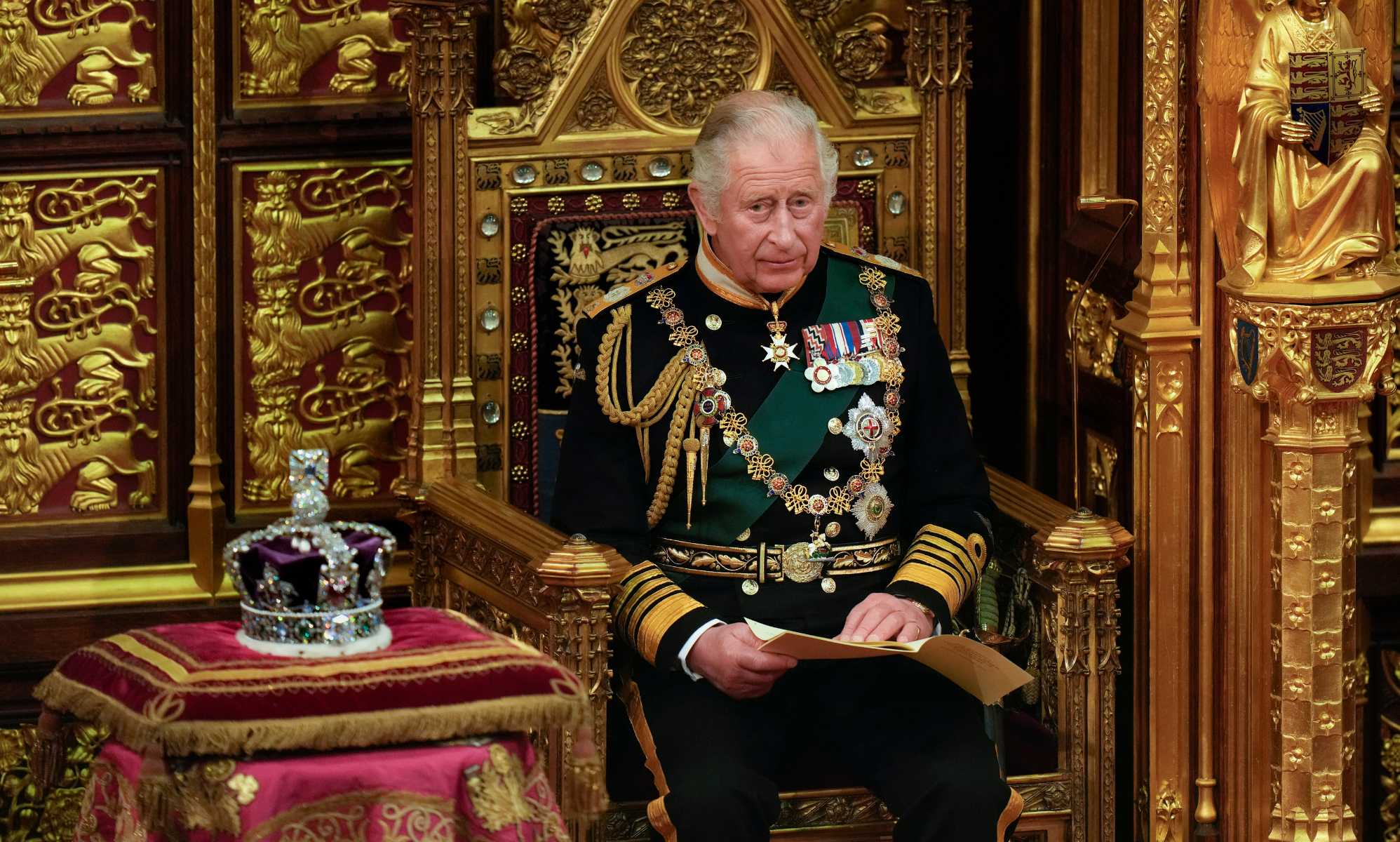 A photo of King Charles III sitting next to St Edward