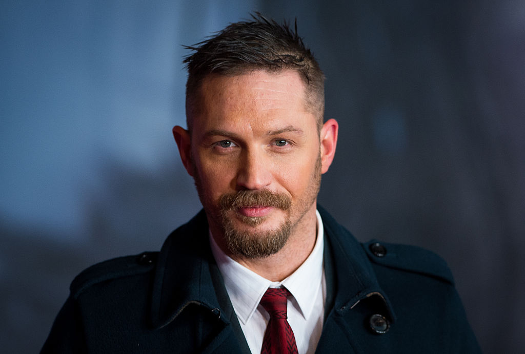 Tom Hardy has been spotted wearing rainbow pride Crocs – and the internet is obsessed