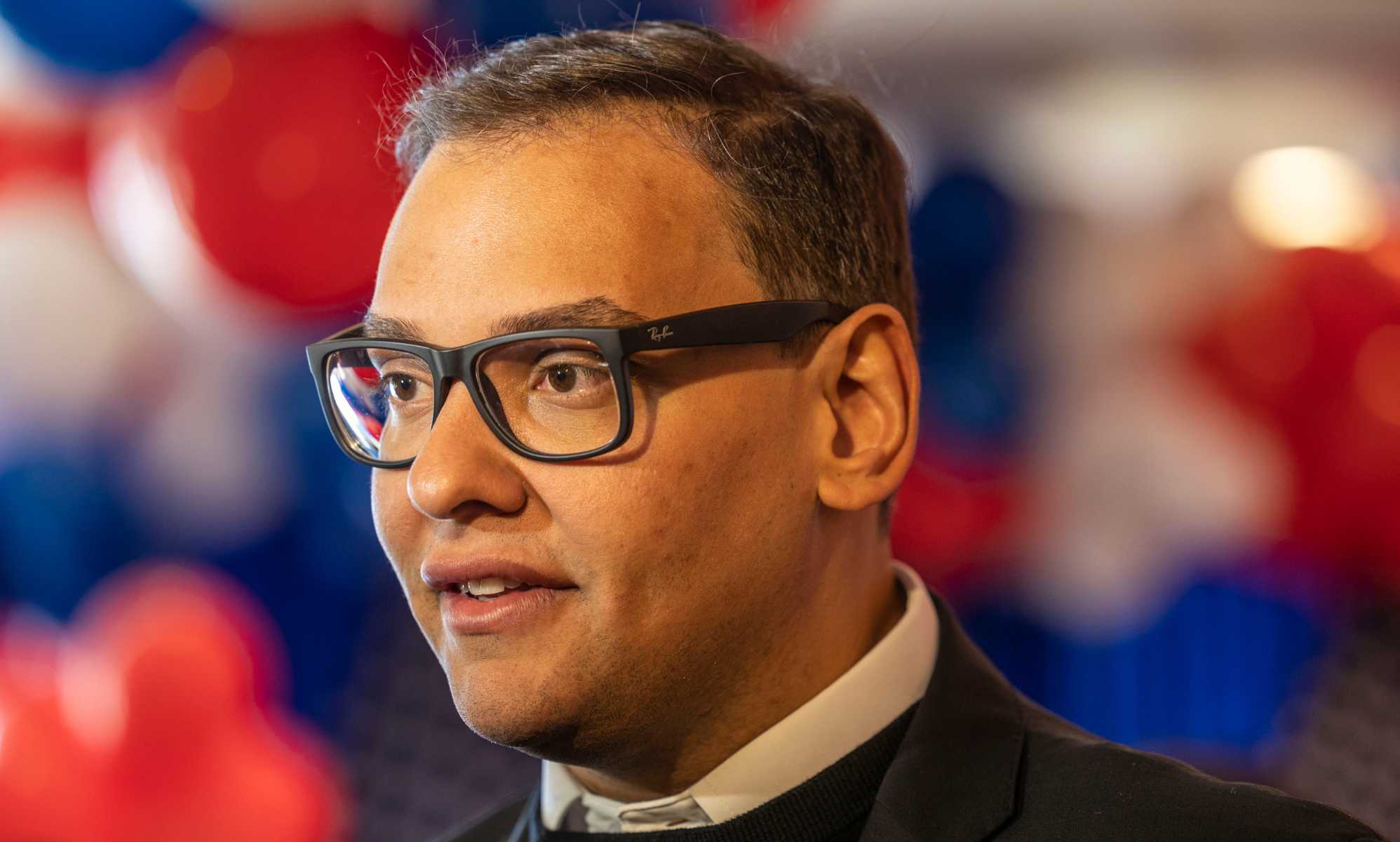 Scandal-hit Republican George Santos denies he was a drag queen – but admits to dressing as a woman