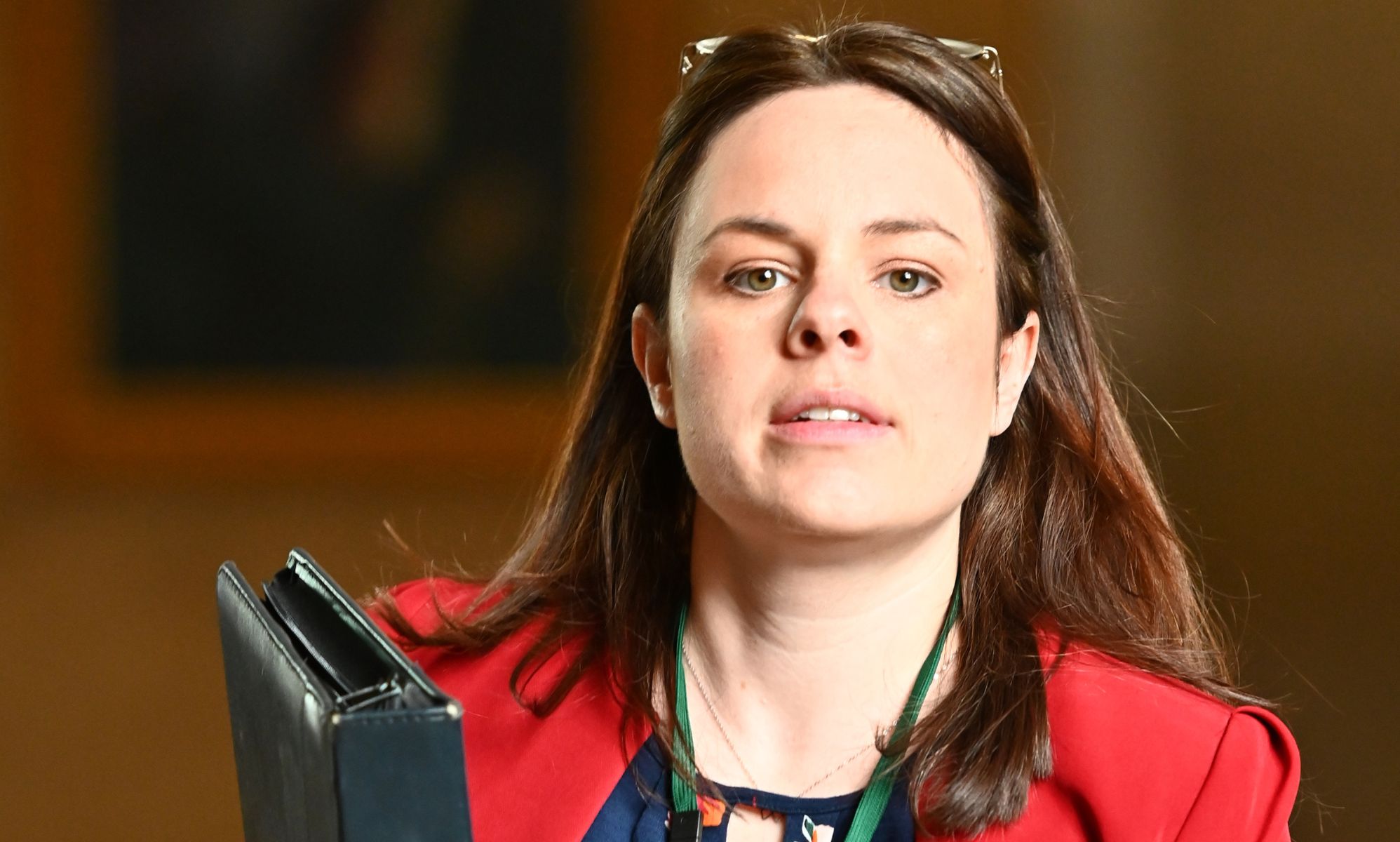 An image of Kate Forbes in a red blazer.