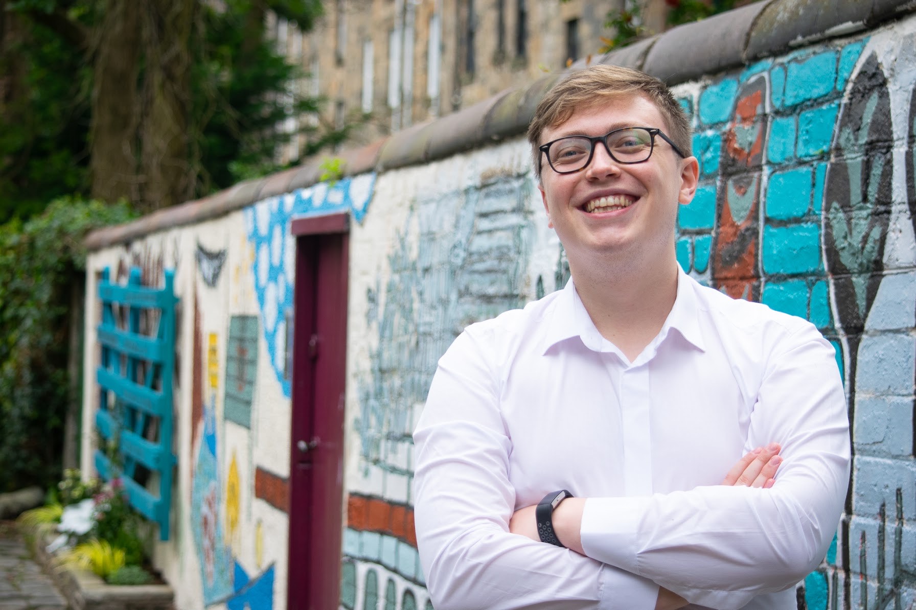 Blair Anderson, a conversion therapy survivor, pictured outdoors. 