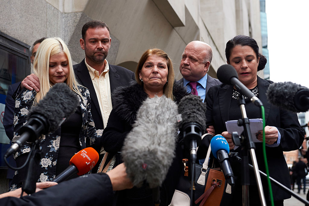 Jenny Taylor (L) and Donna Taylor (R) accompany their mother Jeanette Taylor (C), mother of slain Jack Taylor as they deliver a statement to the media outside the Central Criminal Court in London on November 23, 2016.
British serial killer Stephen Port has been found guilty today of murdering three young gay men Gabriel Kovari, Daniel Whitworth and Jack Taylor to fulfil his sexual fantasies.  / AFP / NIKLAS HALLE