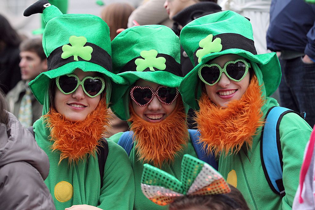 Spectators dressed as leprechauns attend St Patrick