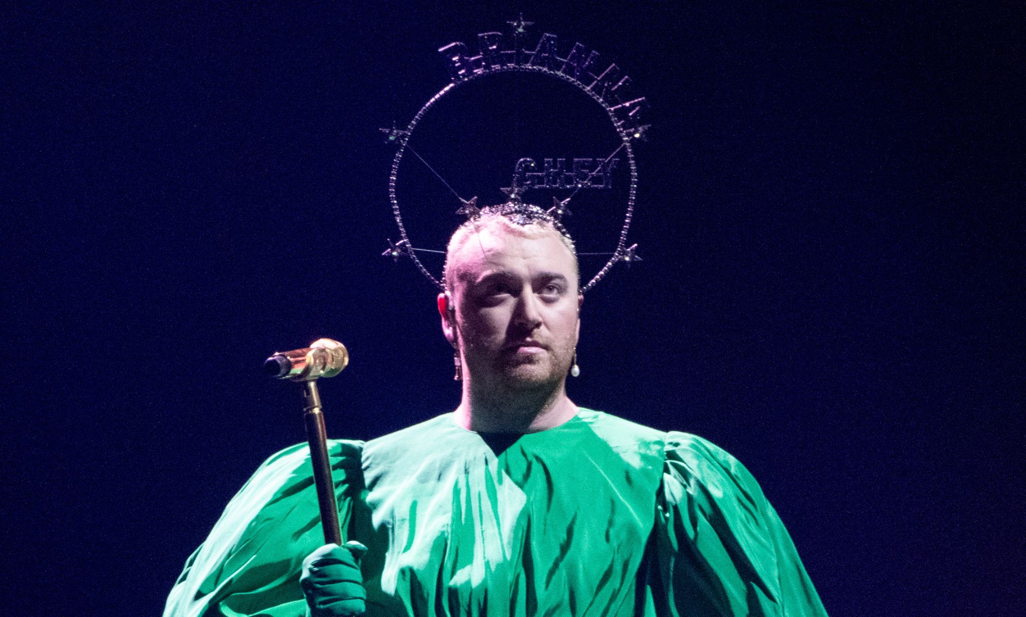 Sam Smith wears a headpiece with Brianna Ghey written on it at the Gloria Tour.