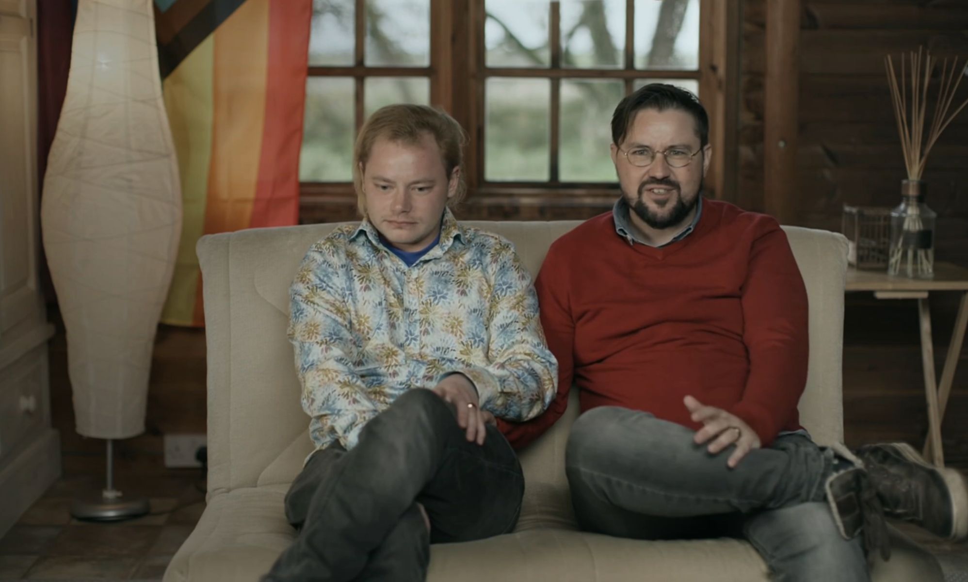 A still image of trans contributors Charlie and Andrew as they sit side by side in an interview for Channel 4