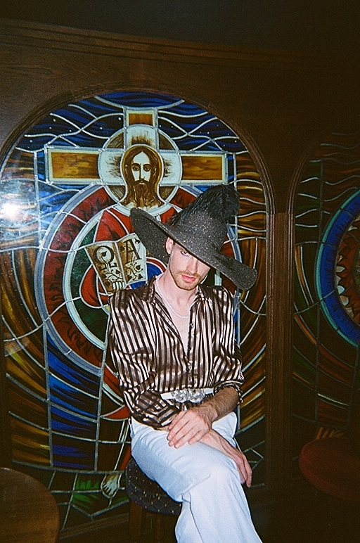 A Chateau reveller posing by one of its original premises