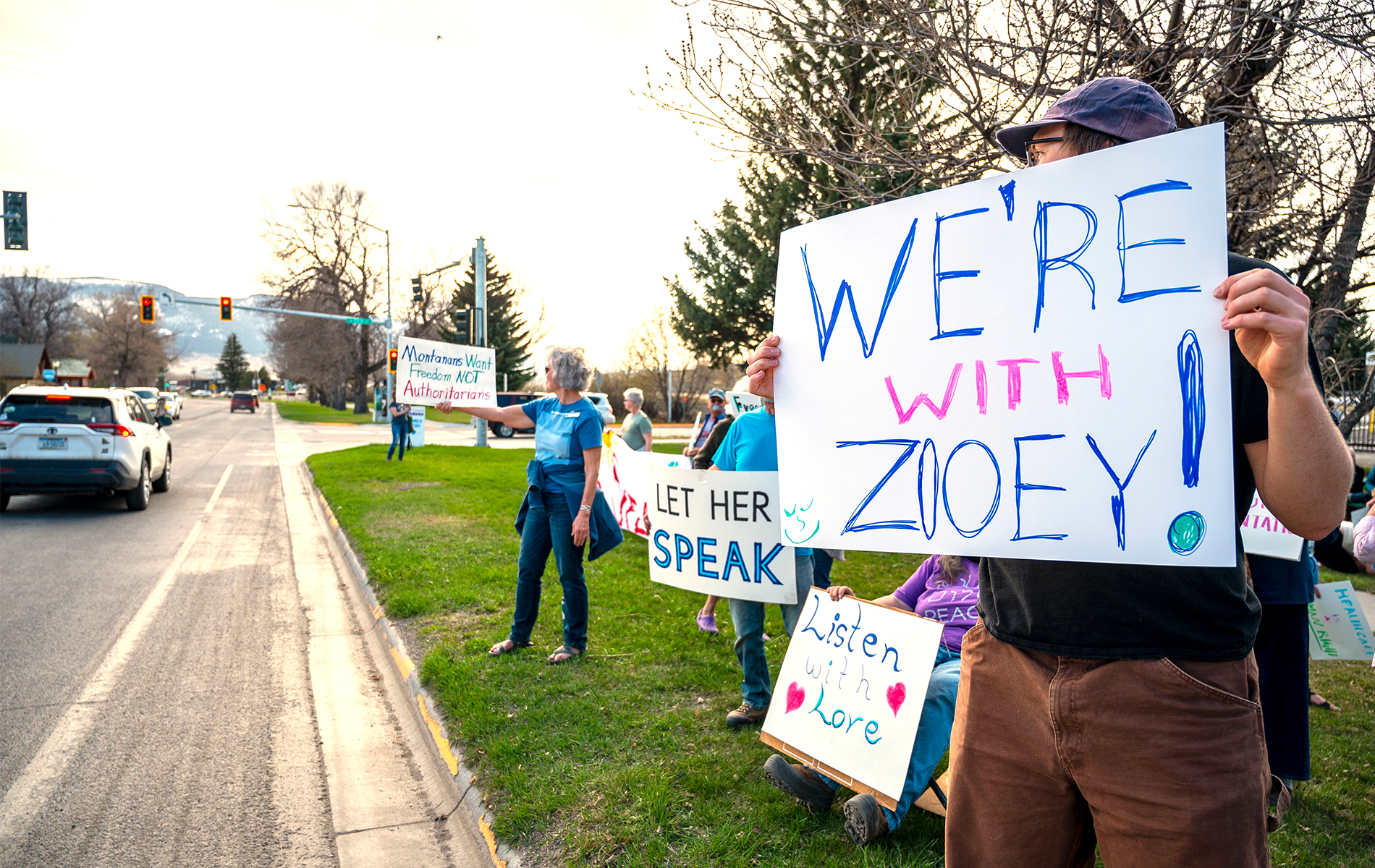 Montana activists holding signs that say &quot;we