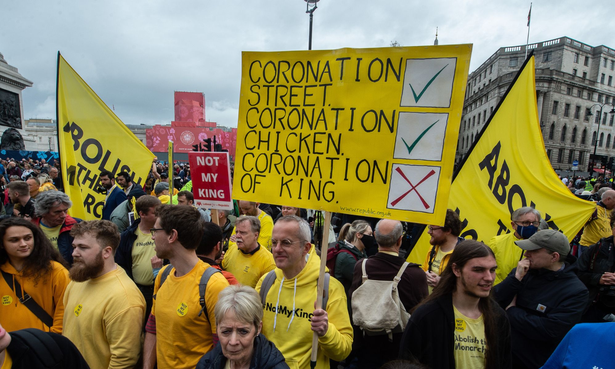 A person holds up a sign in protest of the monarchy on the morning of King Charles III