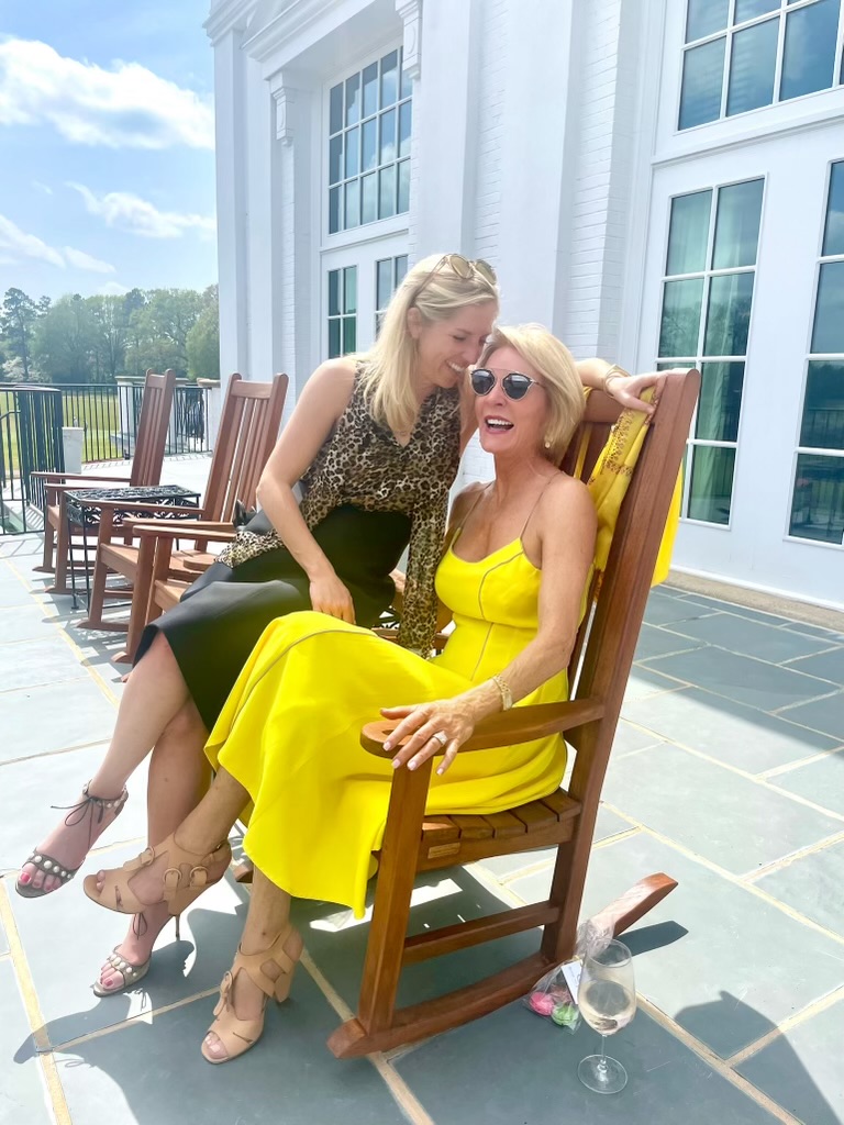 Liz Hilliard (sitting down) with Lee sitting on the arm of the chair. 