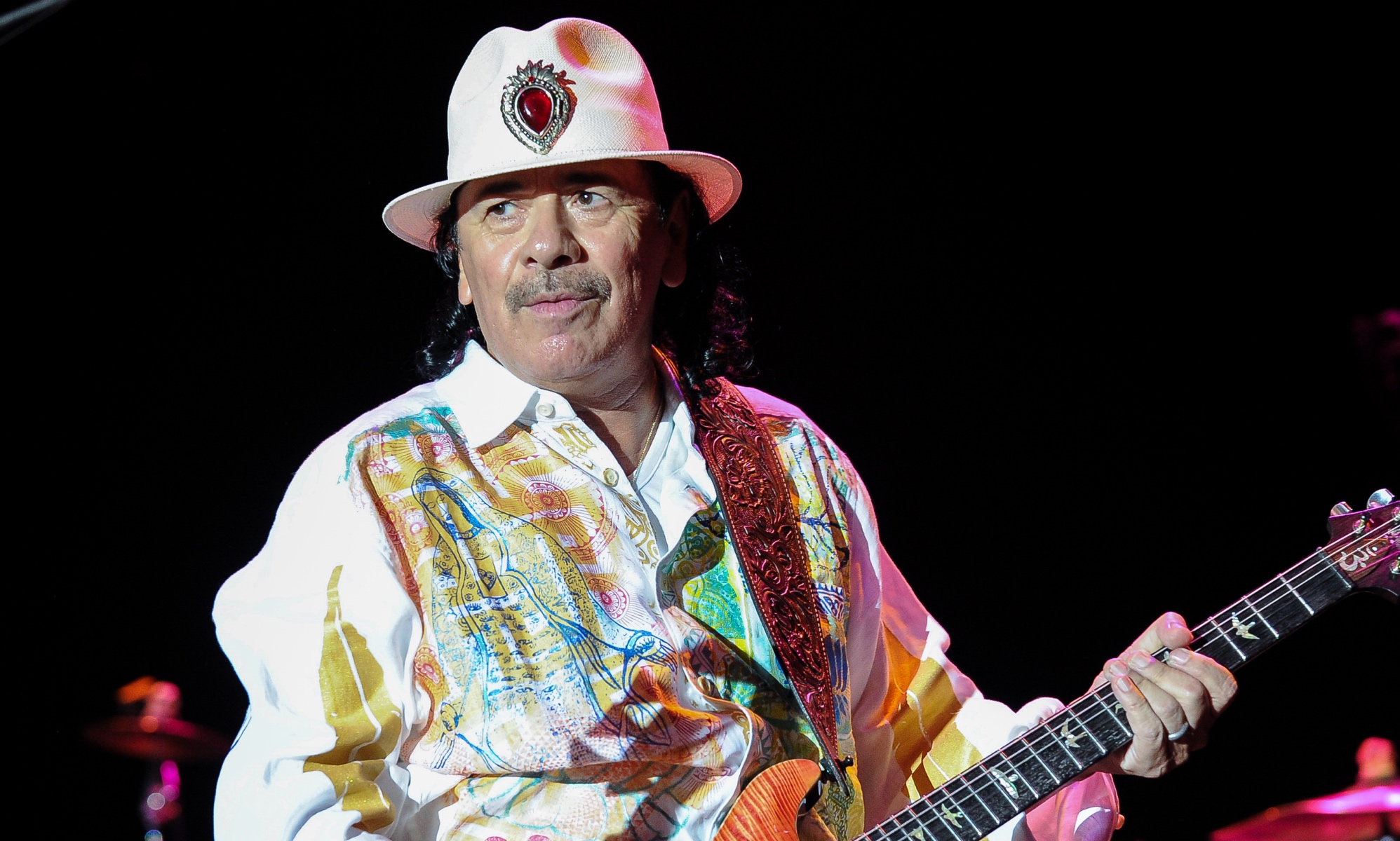 Carlos Santana apologises after concert rant suggesting trans people should stay 'in the closet'