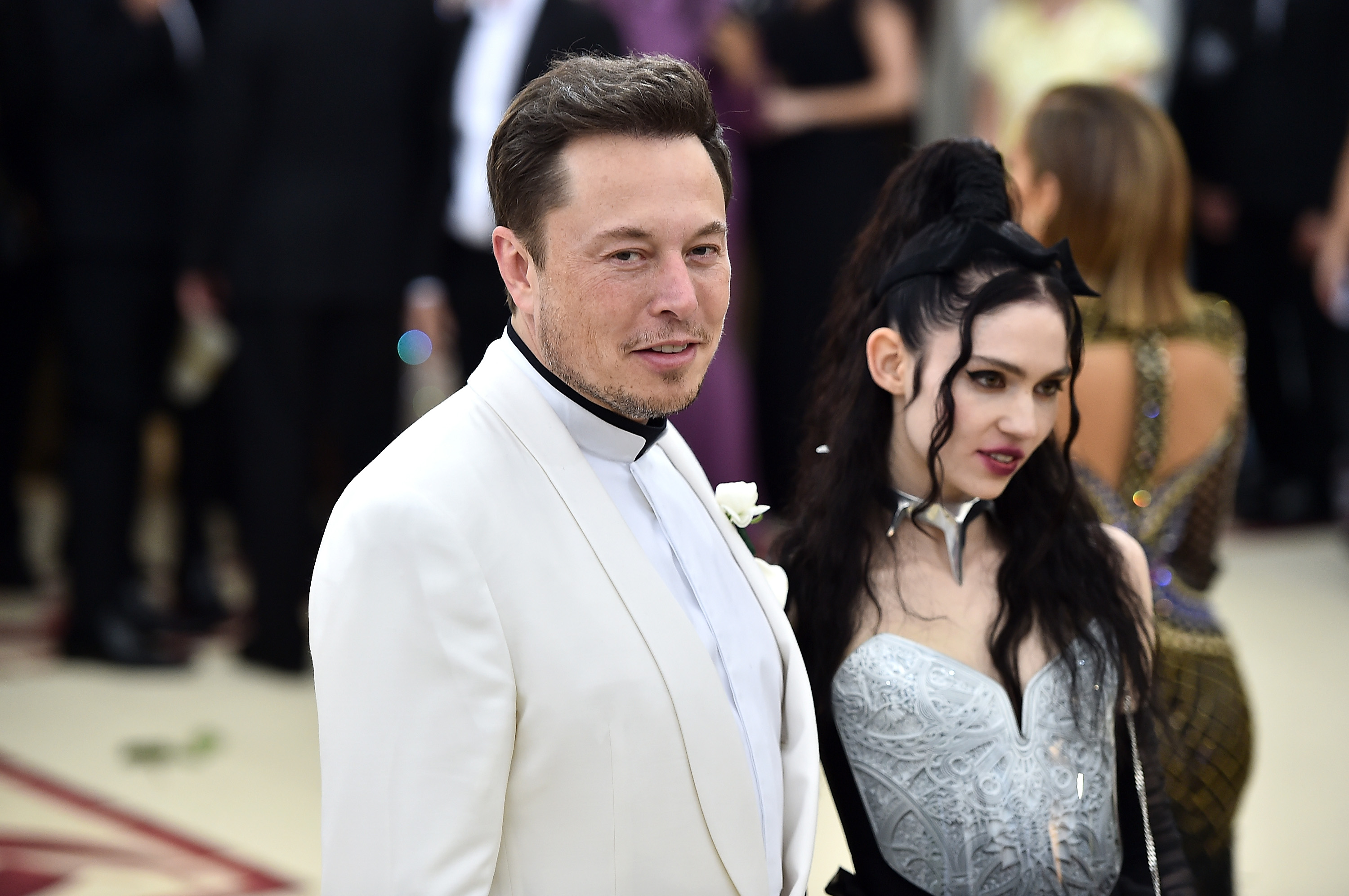 Grimes says Elon Musk 'doesn't hate trans people' and is 'stressed about fertility'