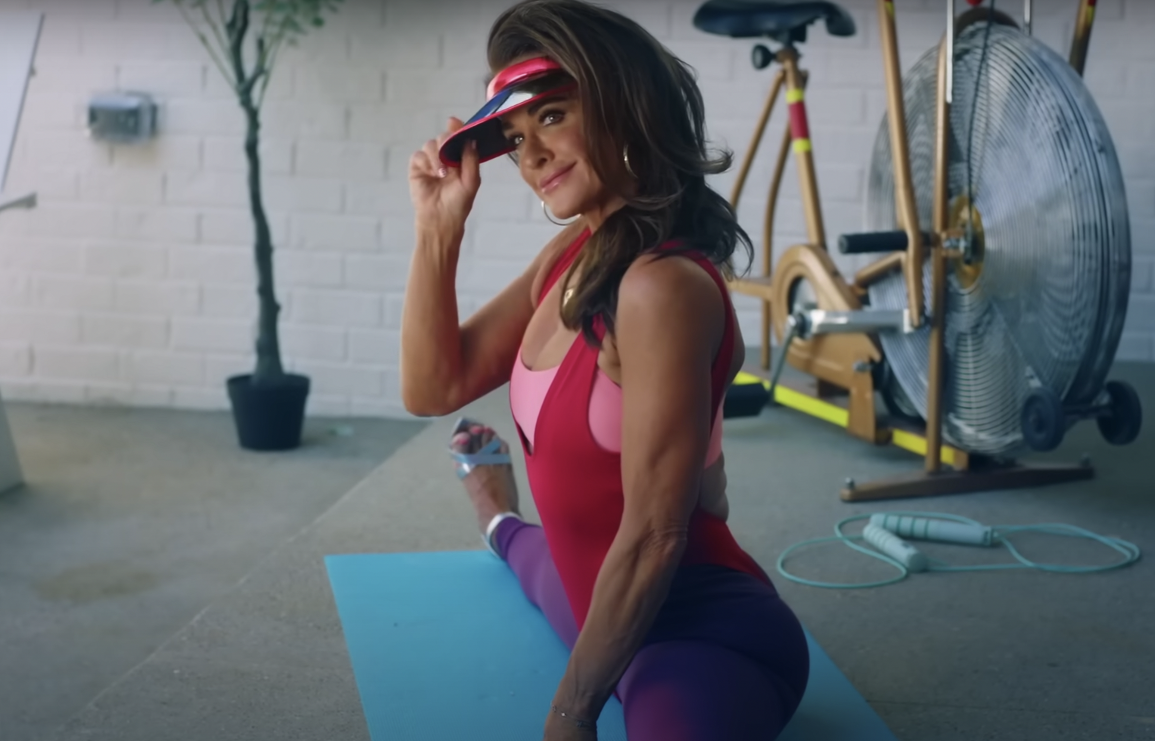 Real Housewives star Kyle Richards does the splits in the music video for Morgan Wade