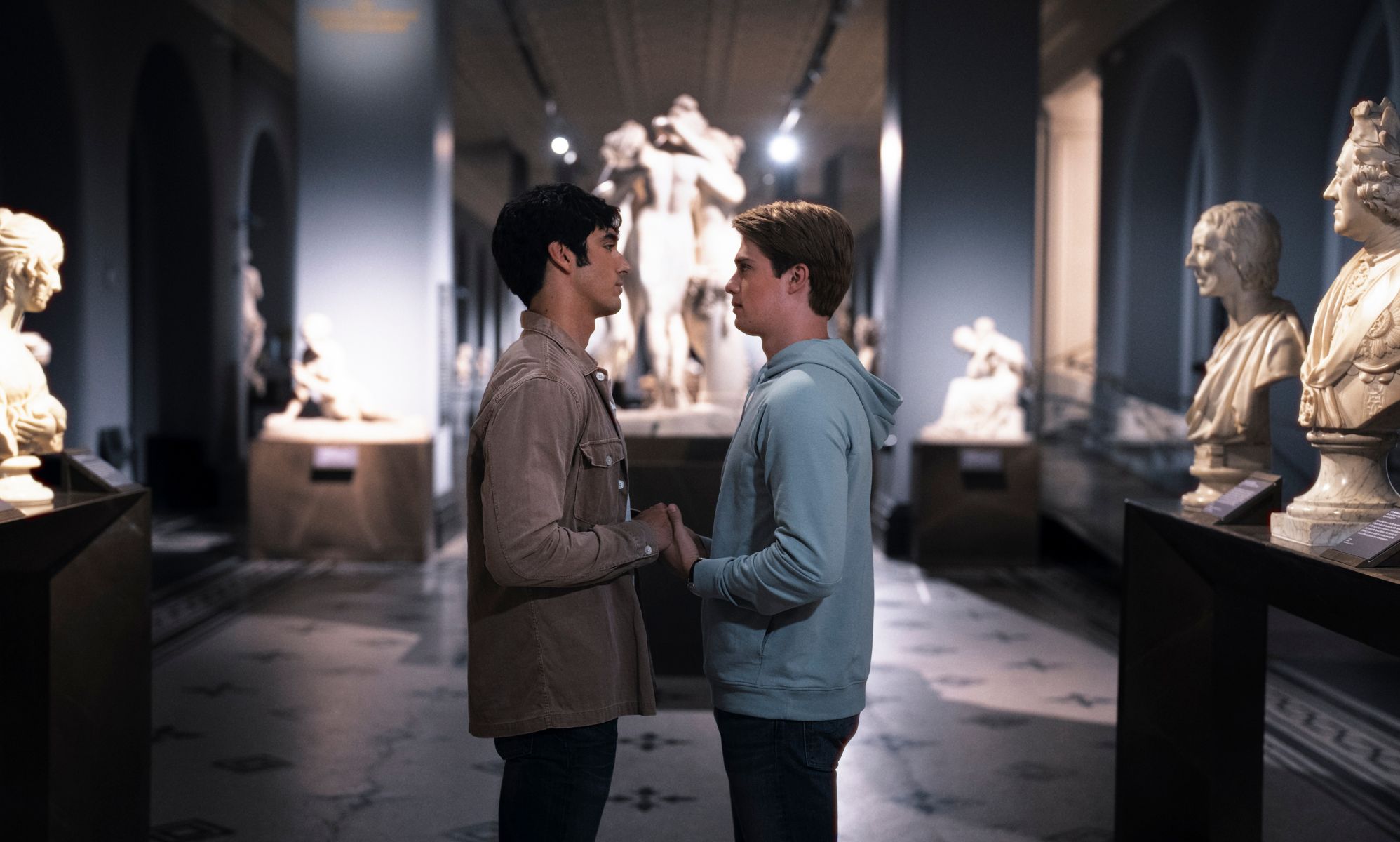 Prince Henry and Alex Claremont Diaz hold hands in Red White &amp; Royal Blue.