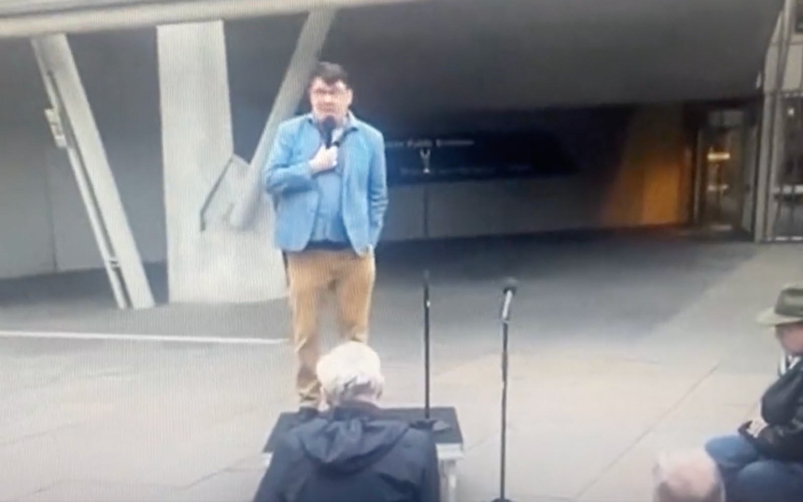 Anti-trans activist Graham Linehan performs 'cancelled' comedy show on street to tiny crowd