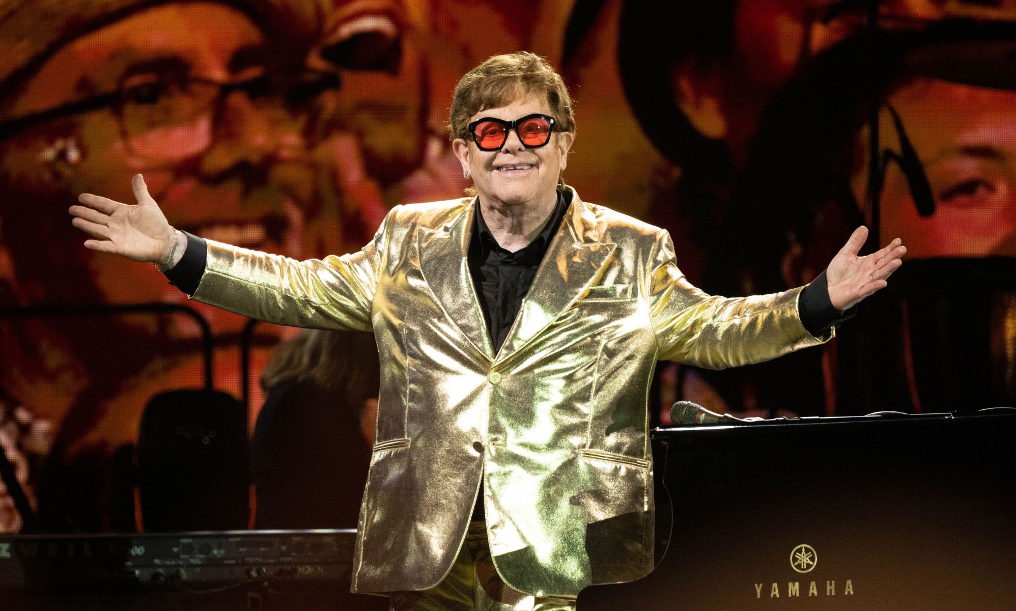 Elton John auctions his flamboyant wardrobe on eBay to raise money for AIDS Foundation