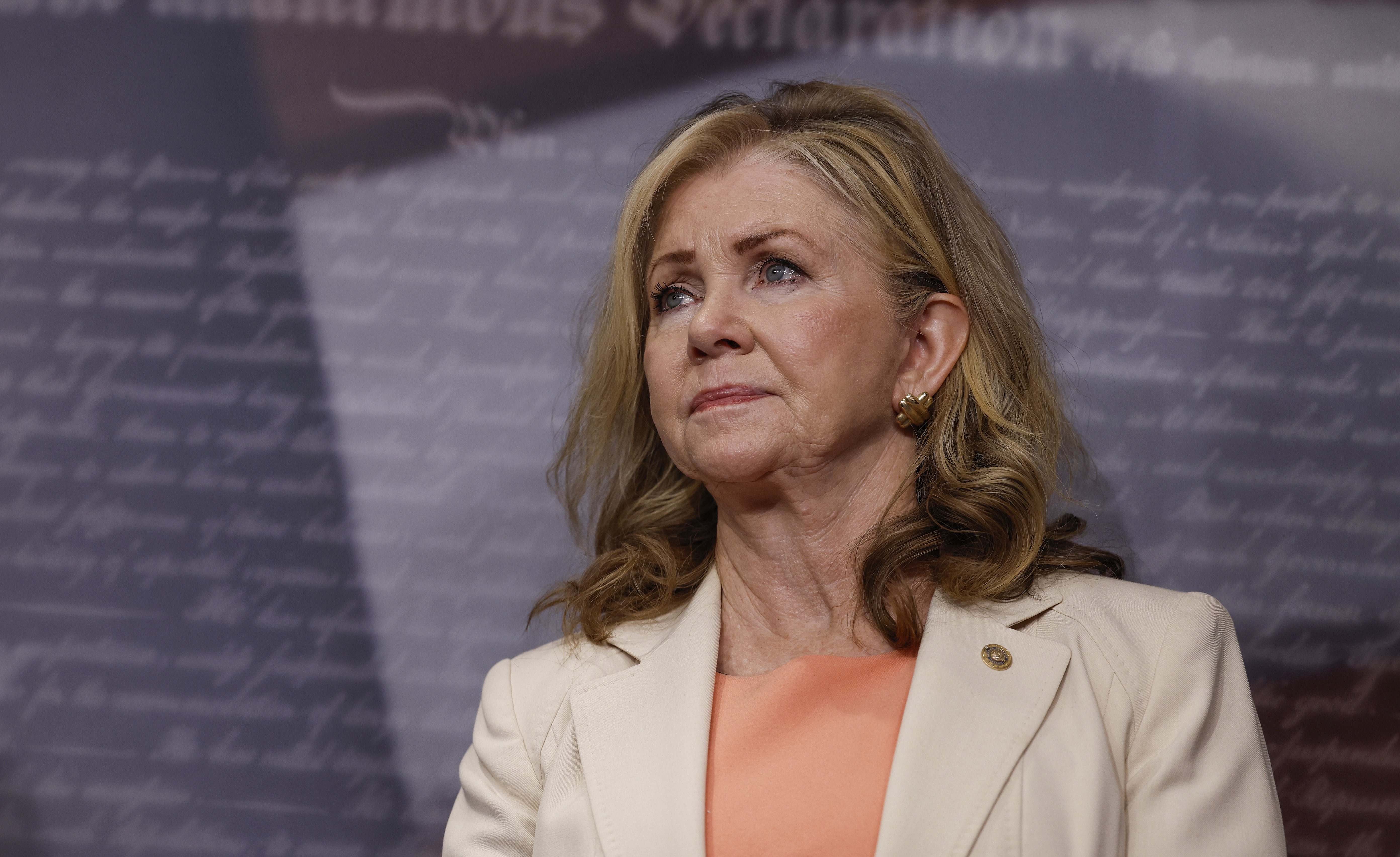 Tennessee senator Marsha Blackburn wears a beige blazer and pink top