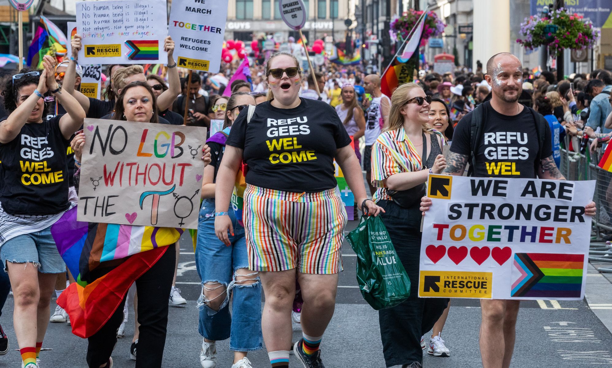 Pro-LGBTQ+ protestors come out in support of migrants and refugees.