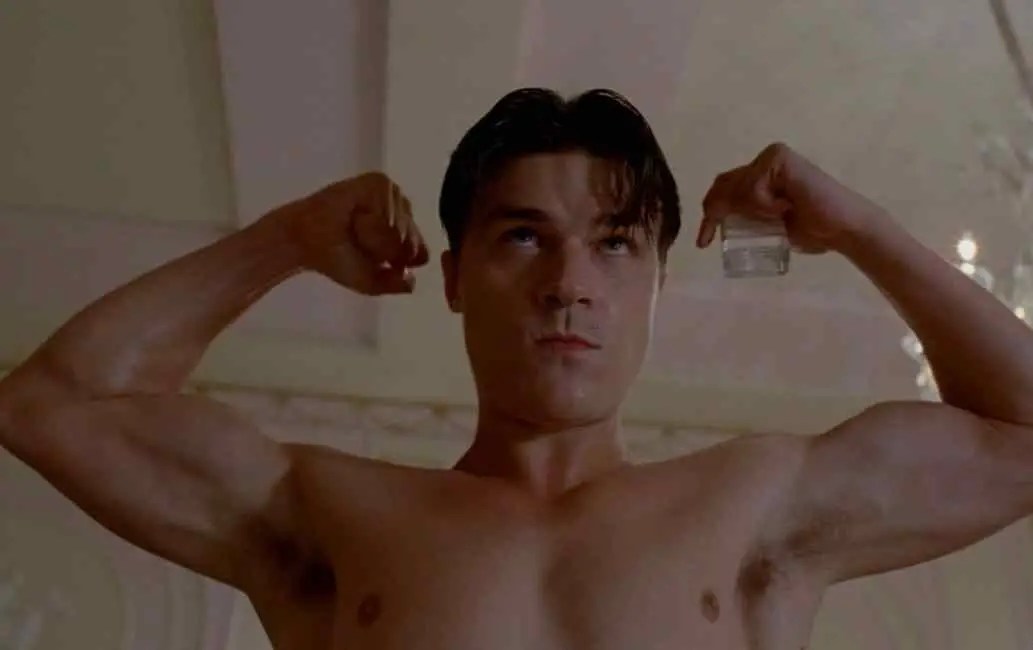 Finn Wittrock flexing his muscles as Dandy in AHS: Freak Show. (FX)
