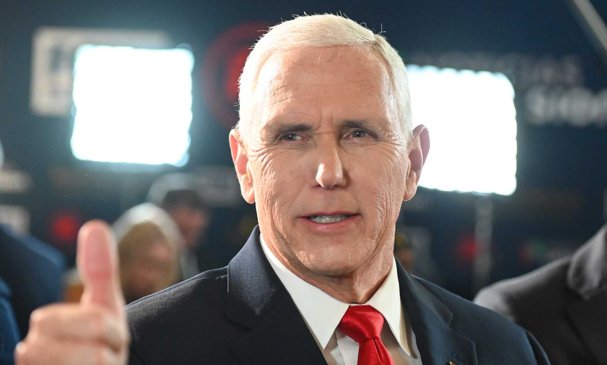 Mike Pence heckled by man claiming they are both gay