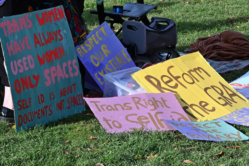 Placards promoting reform of gender recognition laws outside the Scottish Parliament, as inside MSPs prepare to debate the Gender Recognition (Scotland) Bill at Stage 1, on October 27, 2022. 