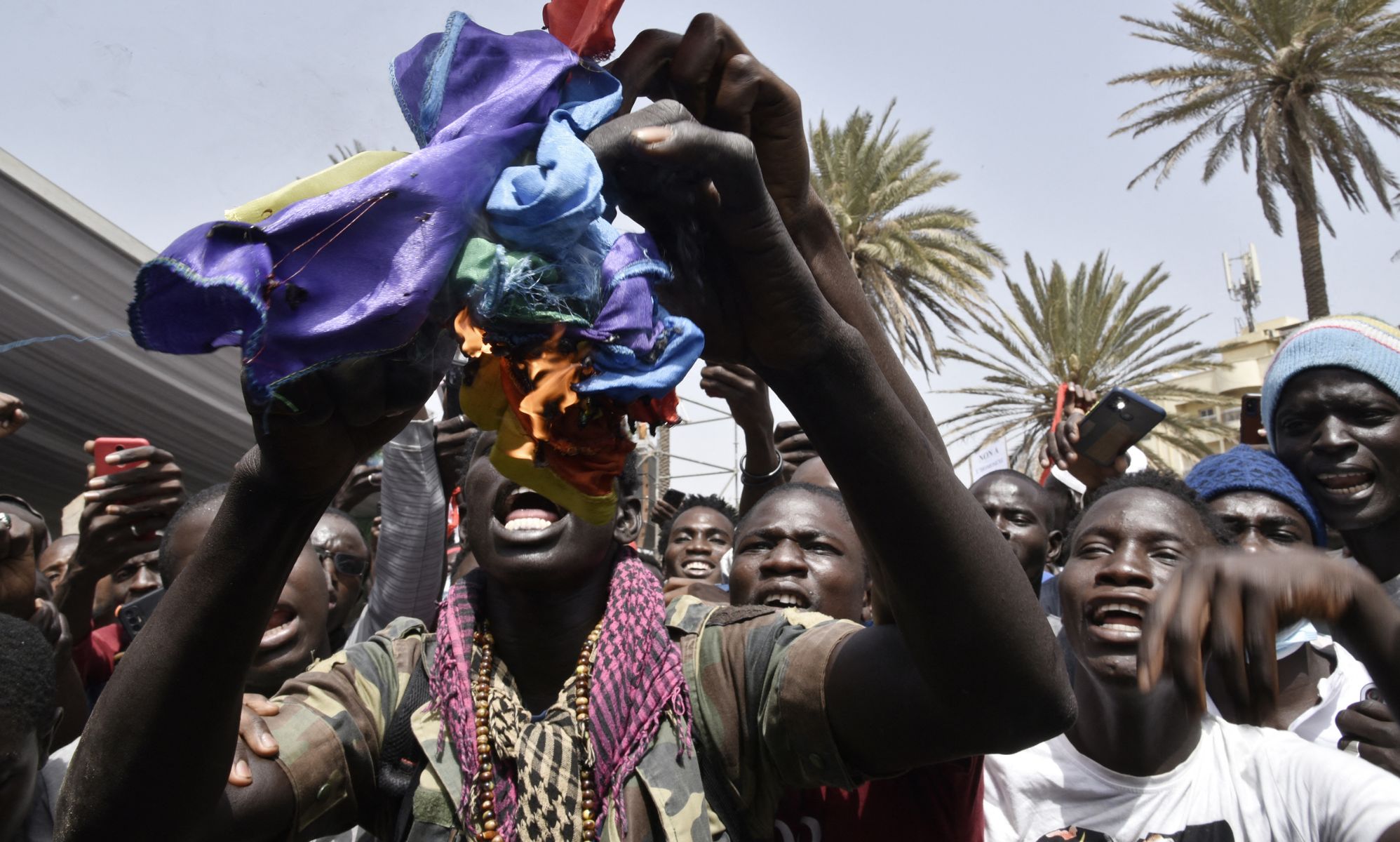 Man's body exhumed and burned publicly in the street 'because he was gay'