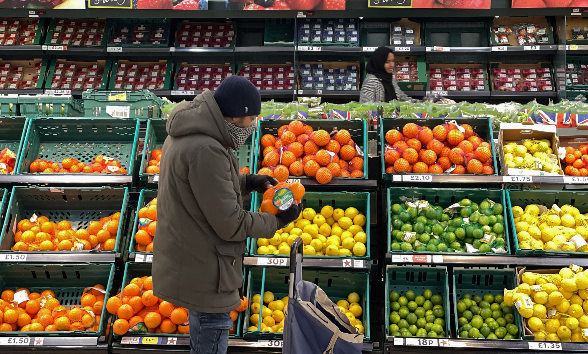 A fruits and vegetables section of a UK supermarket. 