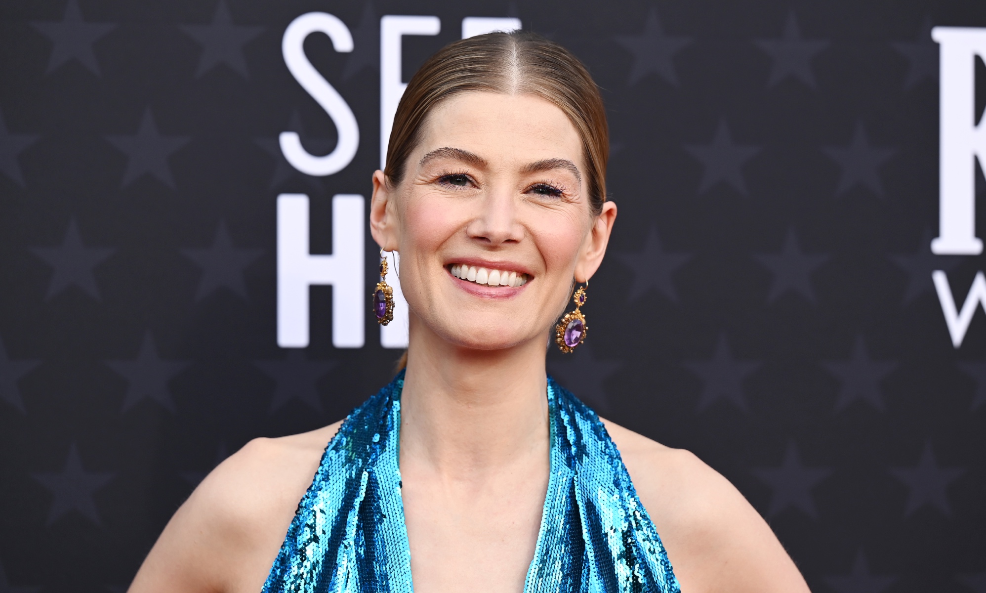 Four moments that prove Saltburn star Rosamund Pike is an icon for lesbians