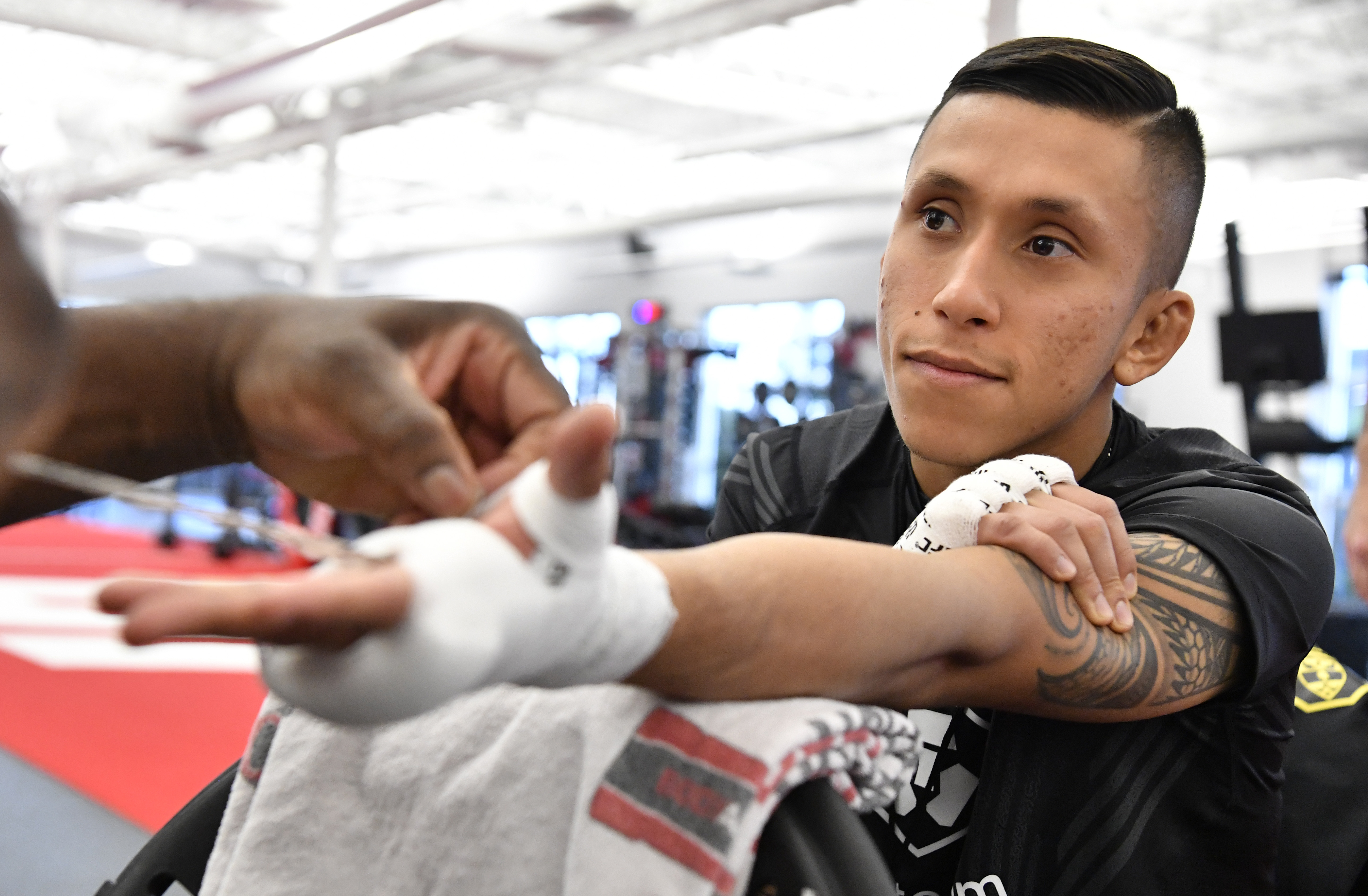 Jeff Molina having his hand wrapped to fight.