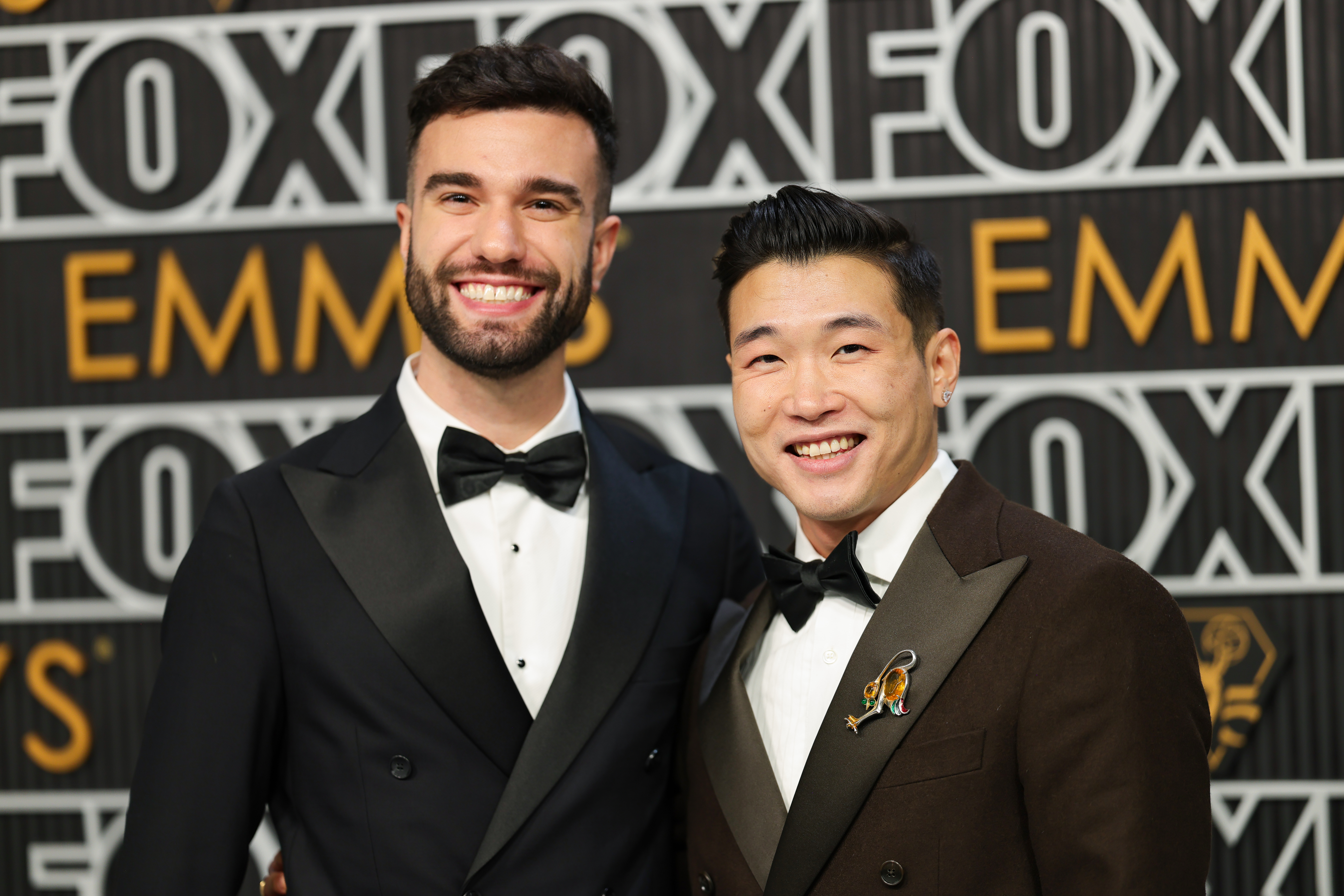 John-Michael Sudsina and Joel Kim Booster at the Emmy Awards.