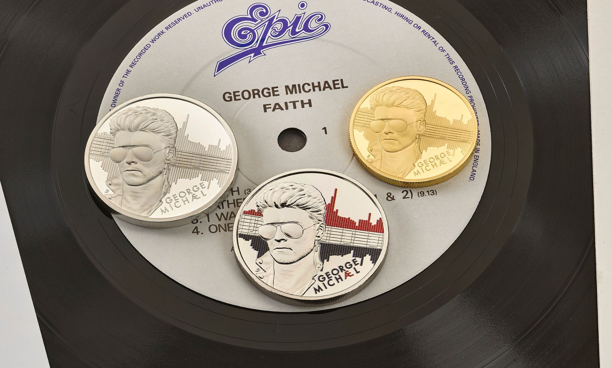 Three coins with George Michael