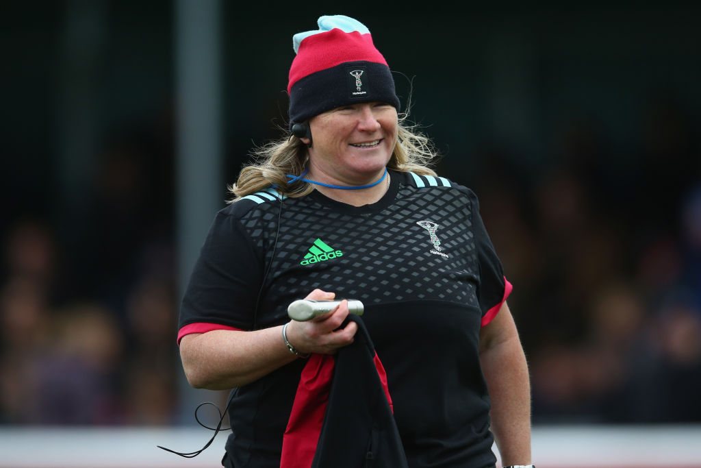 Photo showing Karen Findlay at a rugby match acting as coach, she