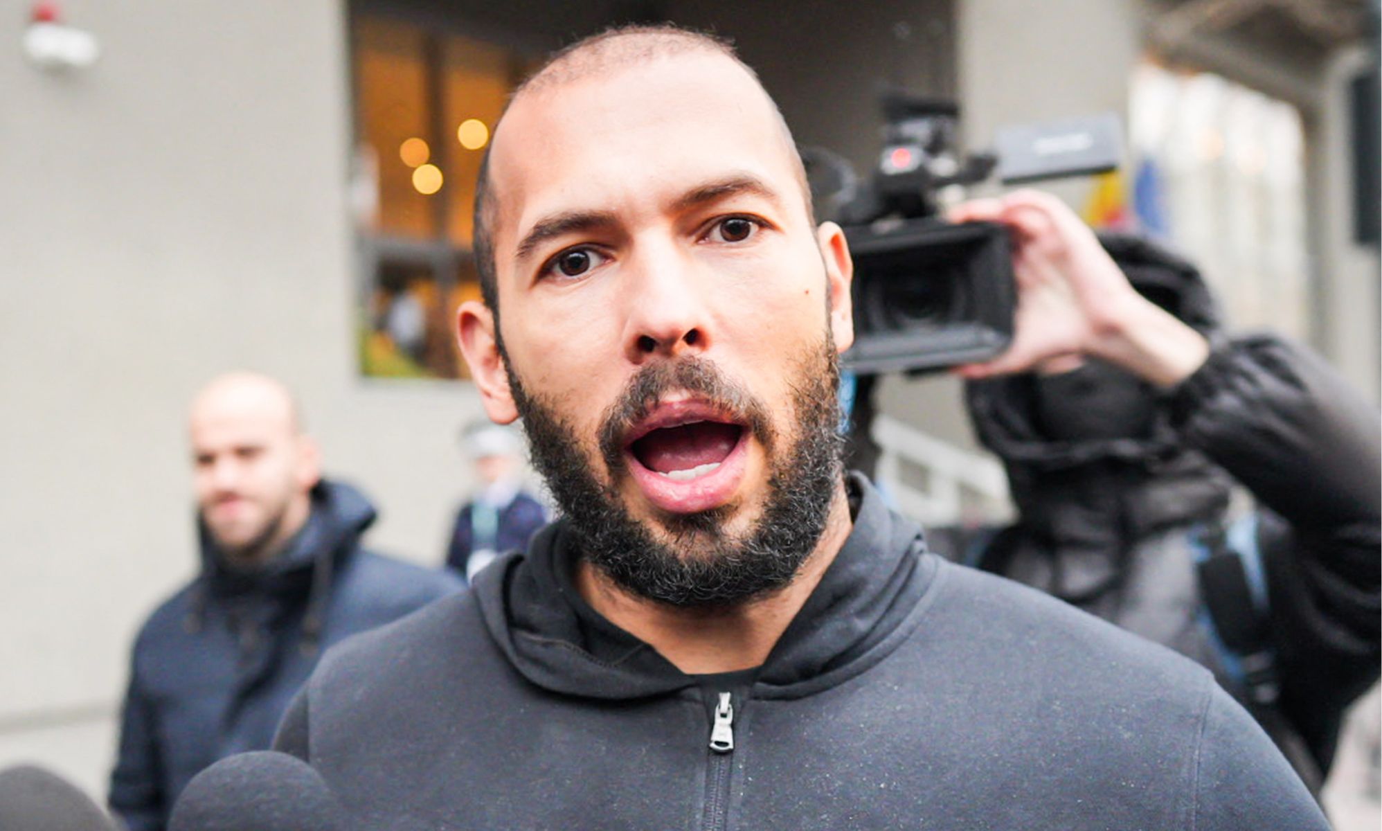 Andrew Tate seems to claim straight men with girlfriends are ... gay