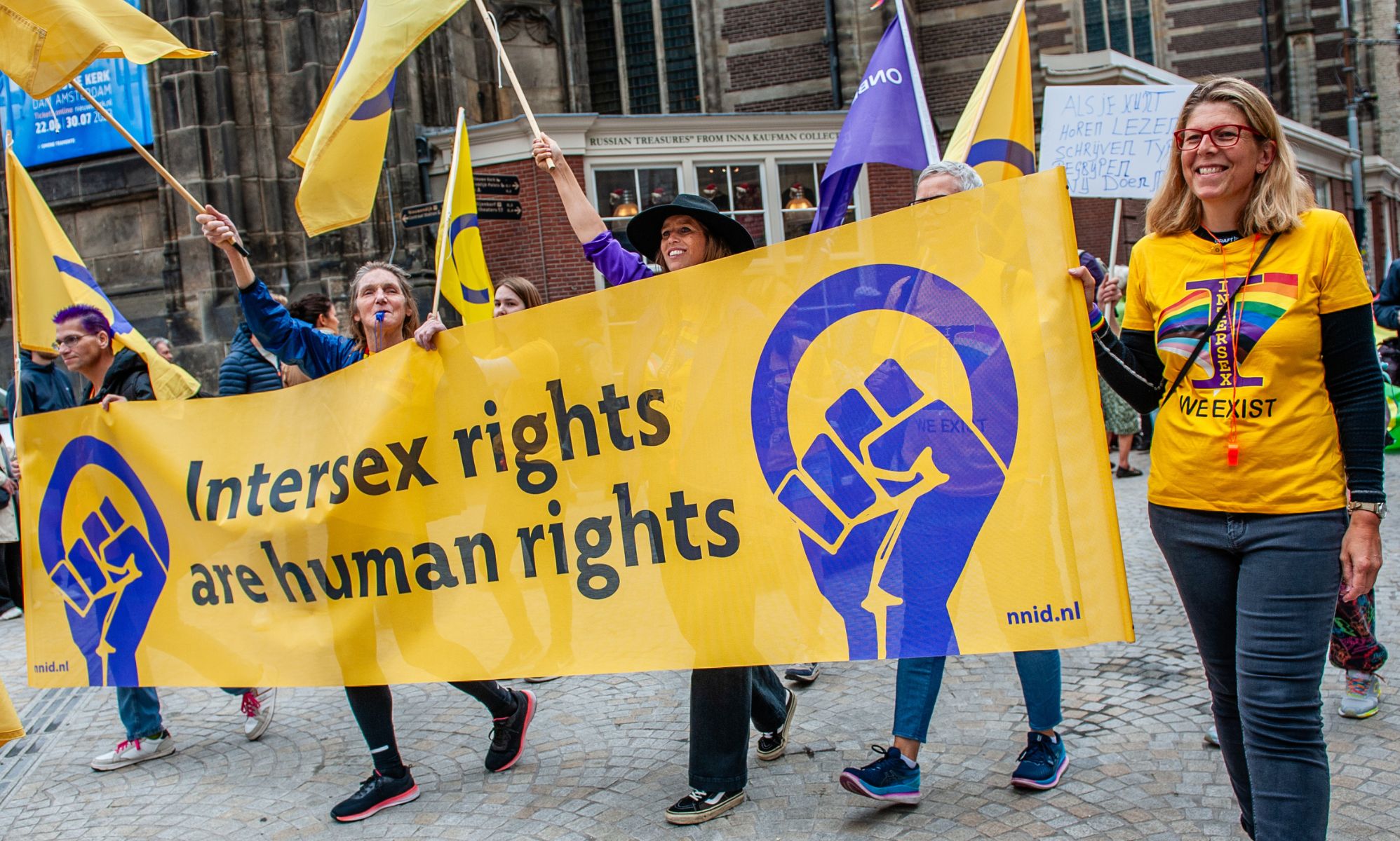 A protest group holding up a sign saying &quot;intersex rights are human rights.&quot;