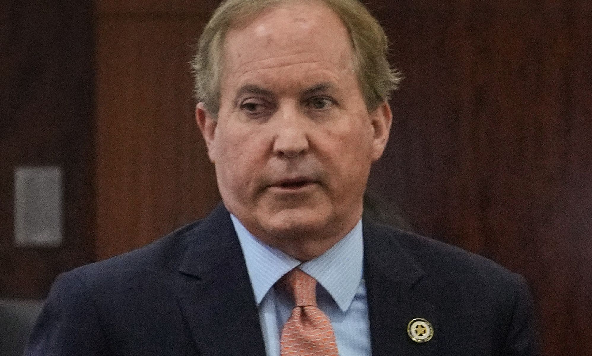 Ken Paxton pictured in a court room.