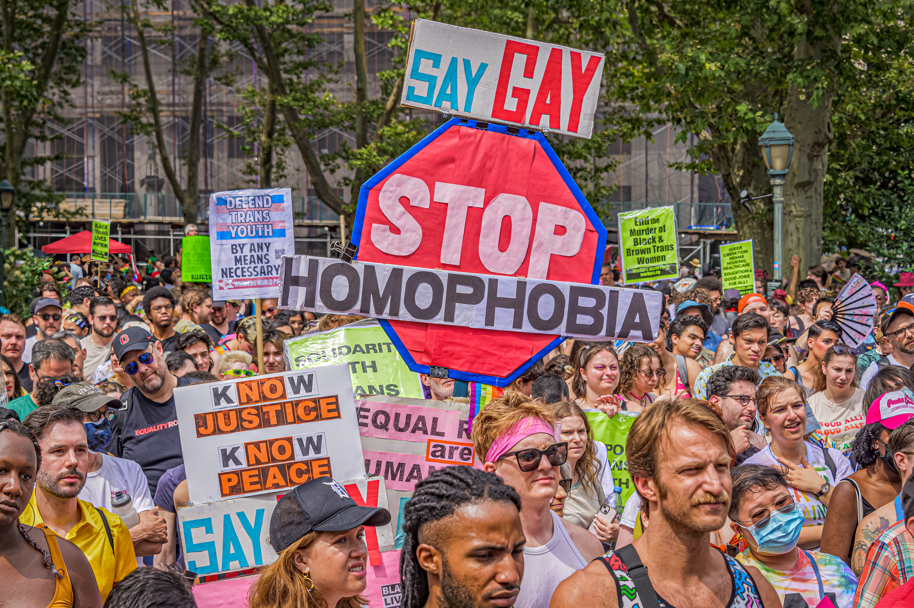 Woman's incredible sign mocking anti-LGBTQ+ protester at Pride goes viral