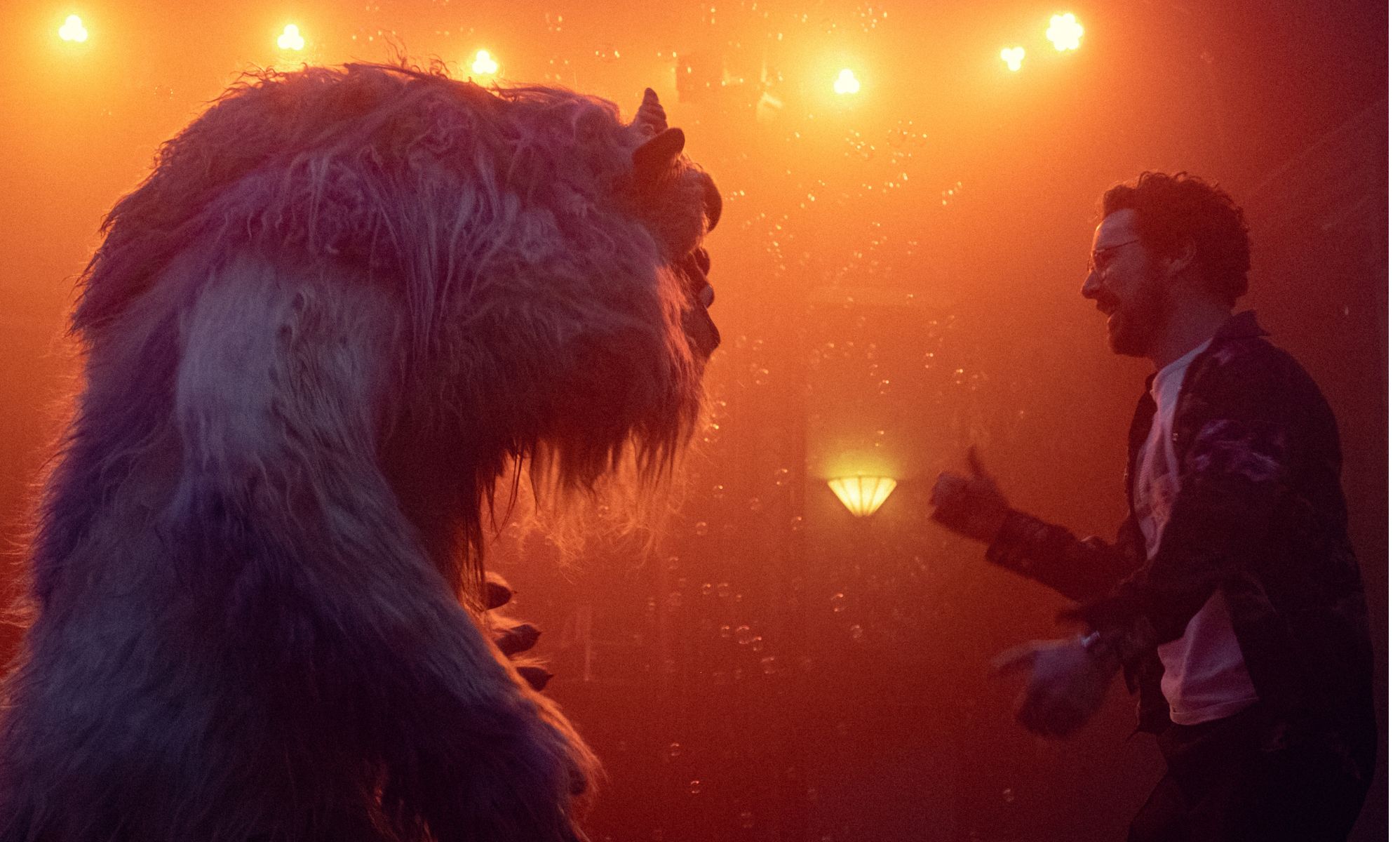 A still from new Netflix show Eric showing Benedict Cumberbatch and puppet Eric dancing.