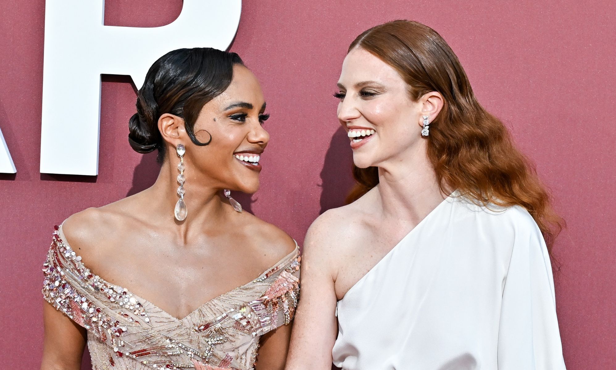 Jess Glynne says she's 'real happy in love' with Alex Scott as she performs at amfAR Gala