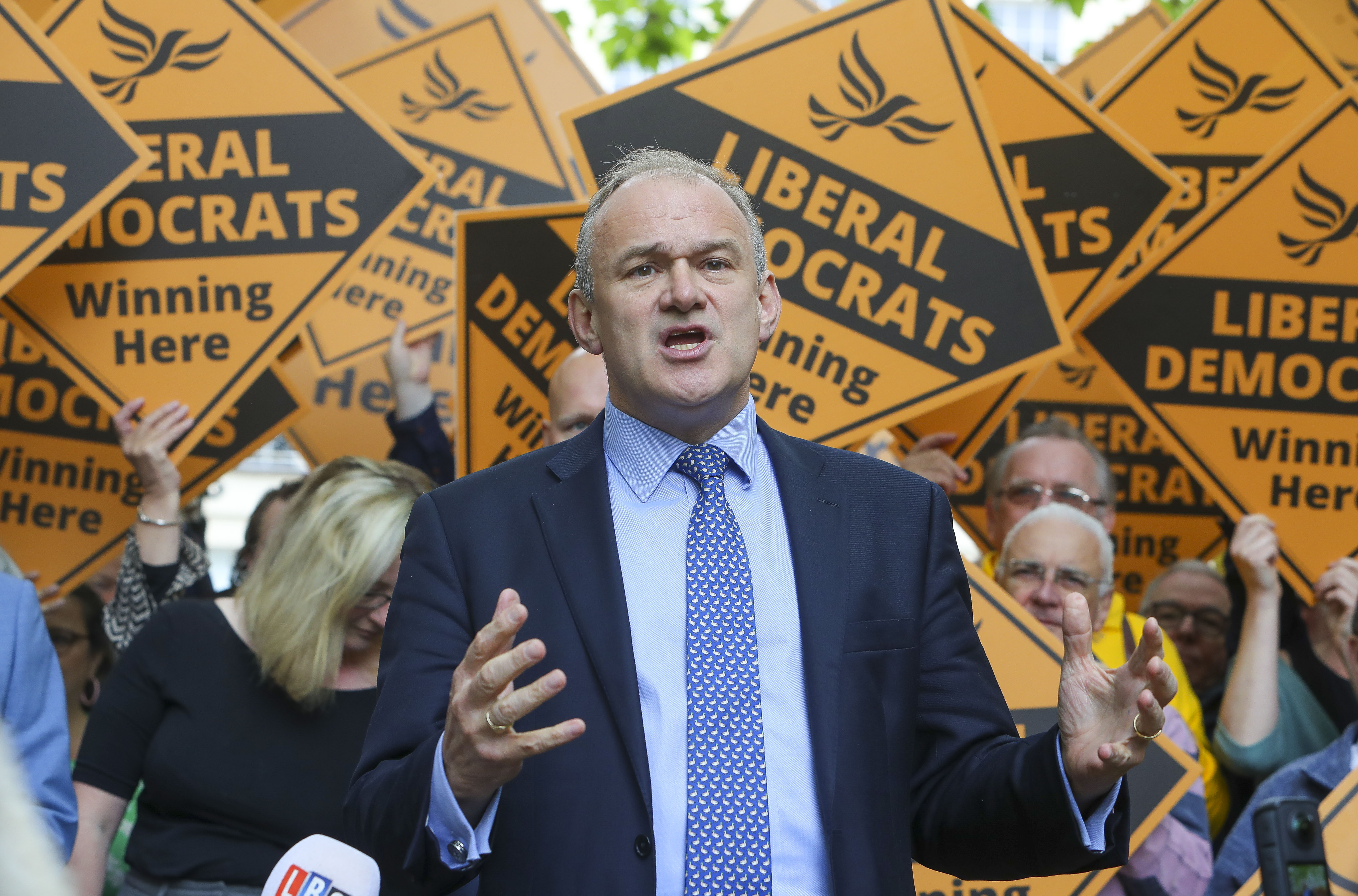 CHELTENHAM, ENGLAND - MAY 23: Ed Davey stands in front of Lib Dem supporters in Cheltenham, England. Rishi Sunak called the UK general election for July 4th, yesterday. The Liberal Democrats currently sit fourth in the polls behind the Reform Party. (Photo by Geoff Caddick/Getty Images)