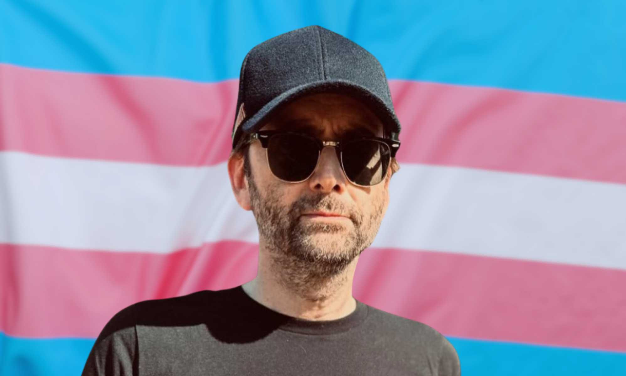 David Tennant and a trans rights flag