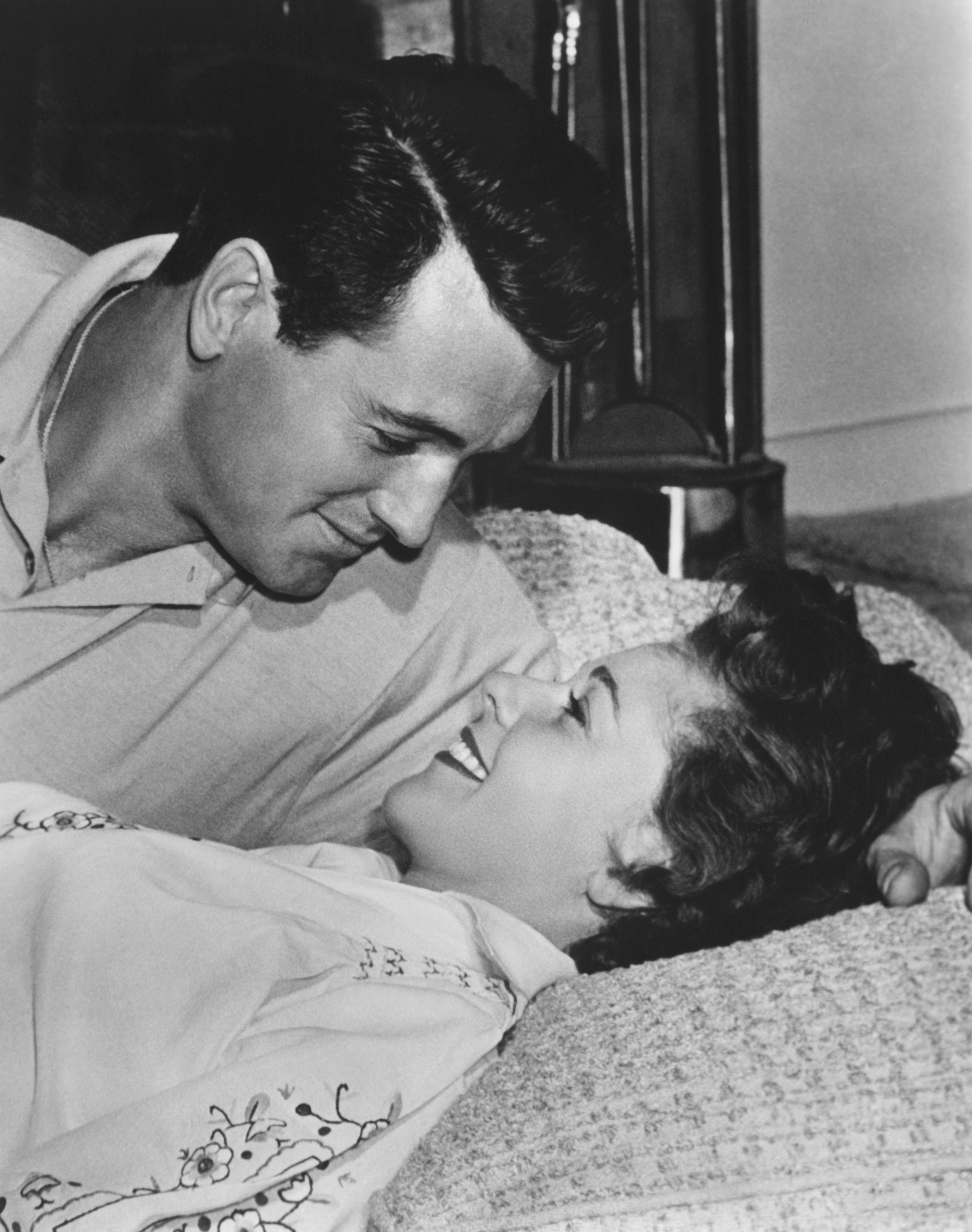 Rock Hudson in a romantic pose with wife Phyllis Gates