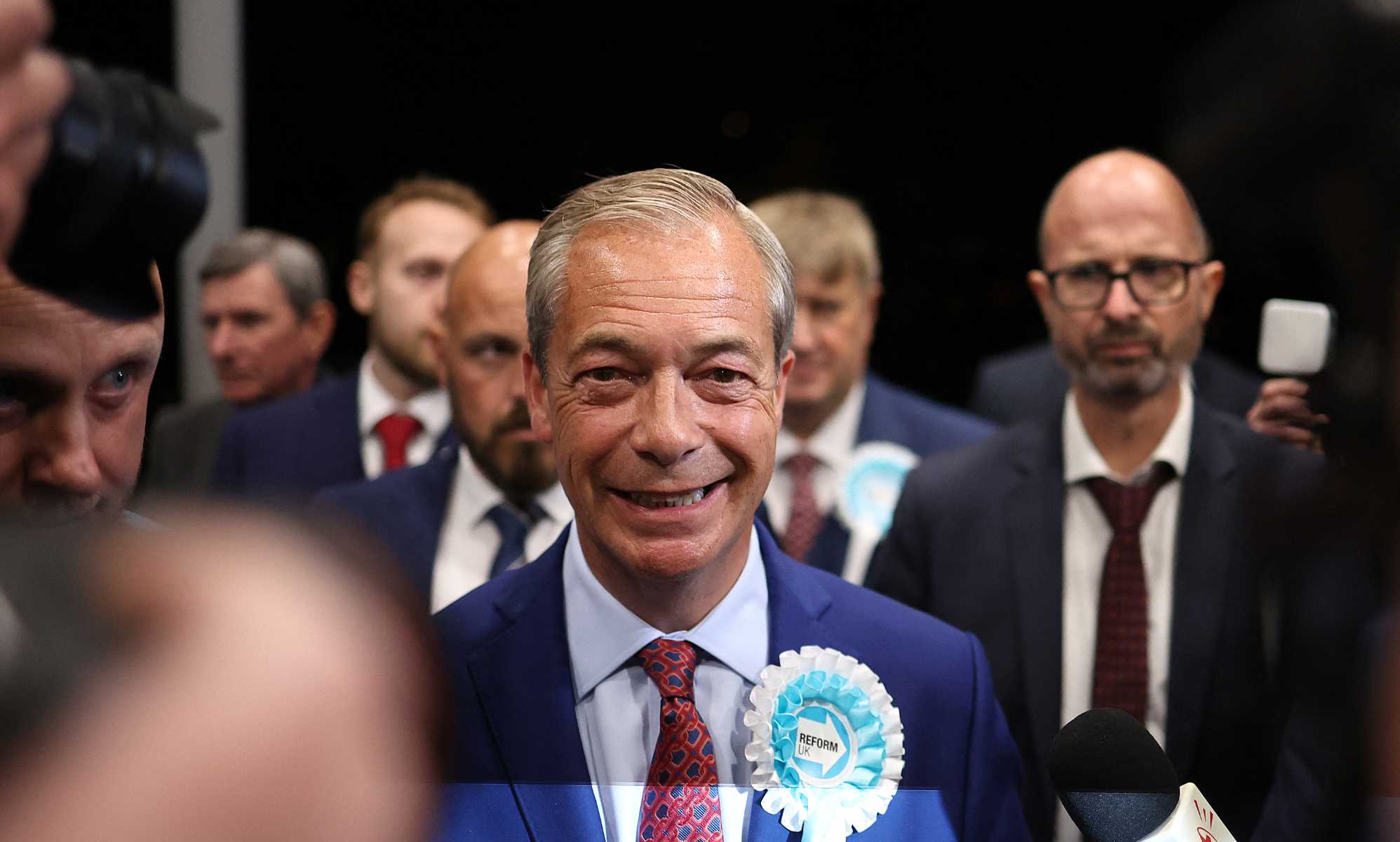 Nigel Farage becomes MP at eighth attempt after winning Clacton seat for Reform UK