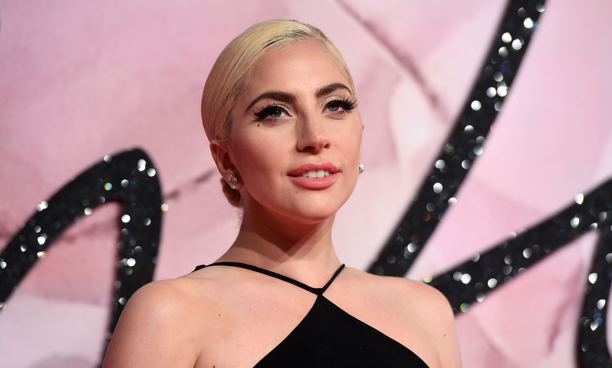 Lady Gaga shares snippets of new album from the roof of a car in Paris