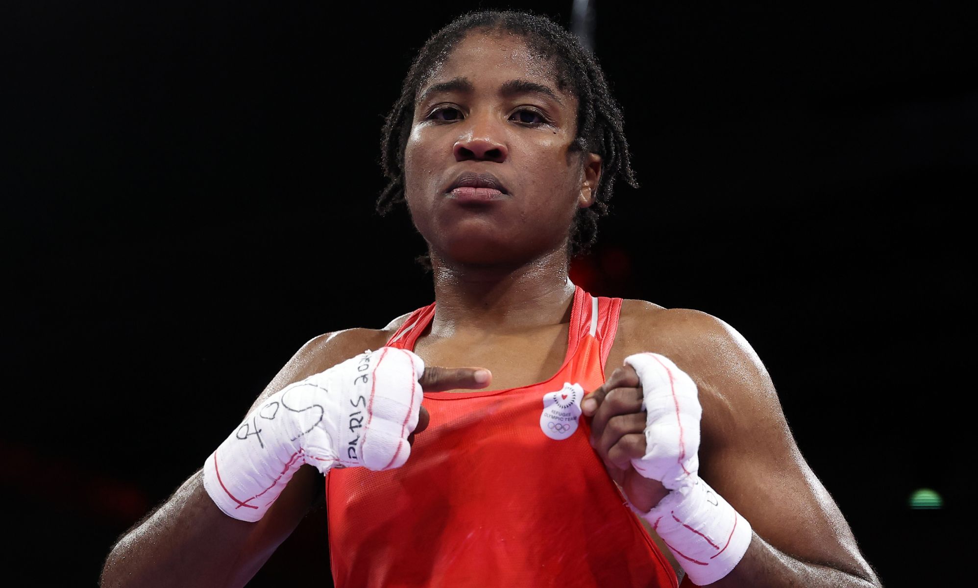 Gay boxer Cindy Ngamba makes history after securing Refugee Olympic Team's first medal