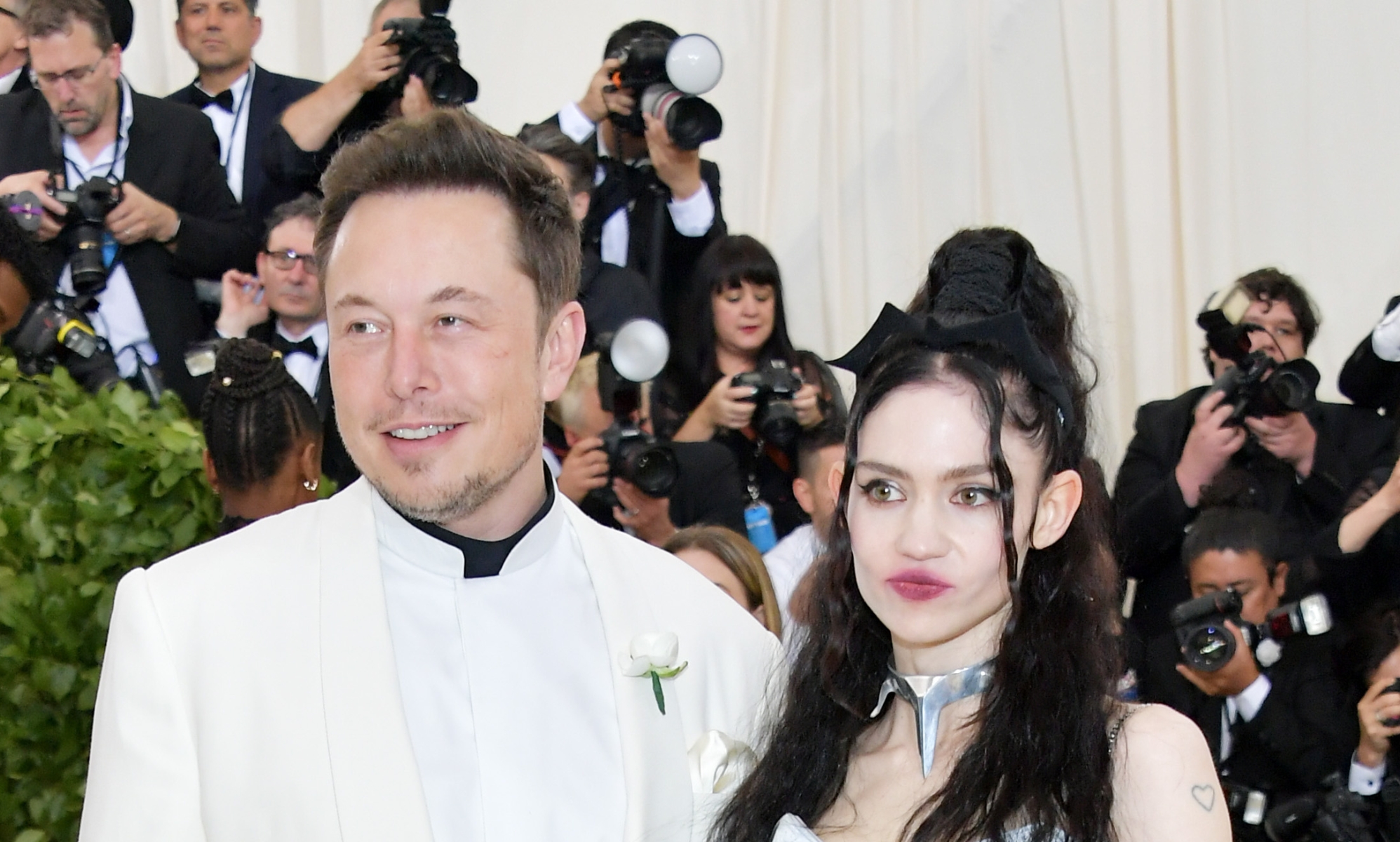 Elon Musk's ex Grimes sparks controversy by saying she became 'way less gay' after pregnancy