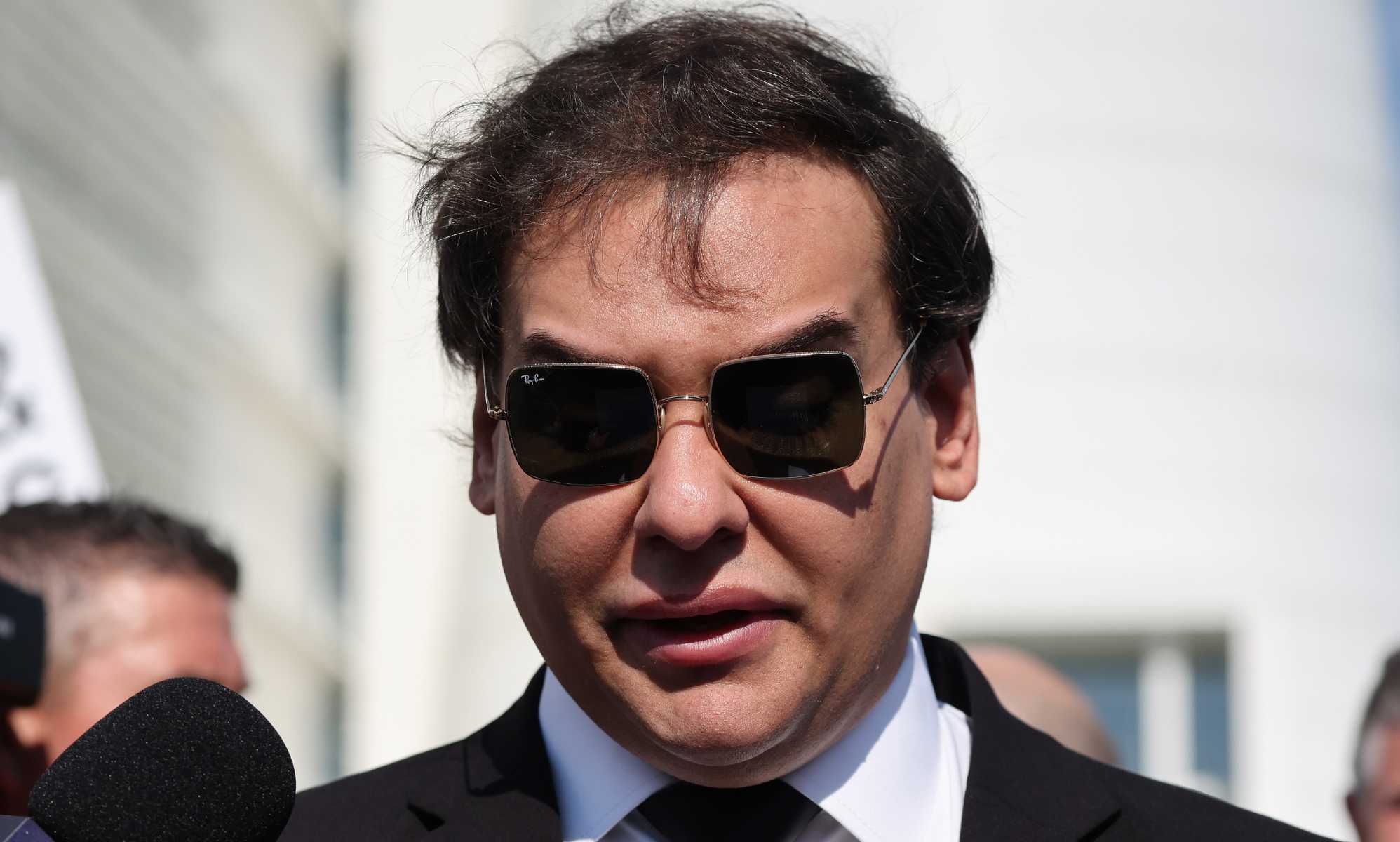 Disgraced gay former congressman George Santos pleads guilty to fraud charges