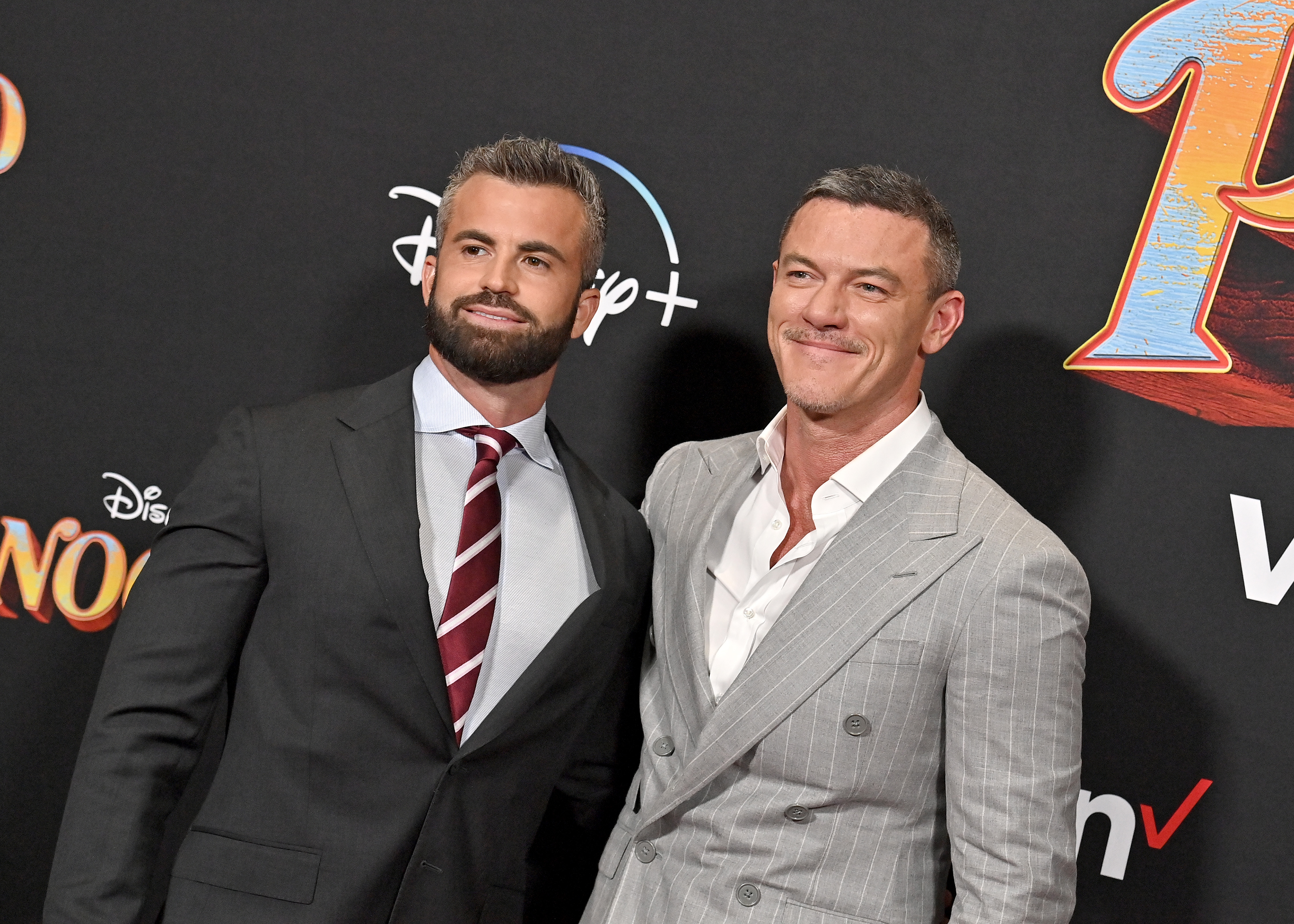 Luke Evans says his partner keeps him 'grounded' amid worldwide fame