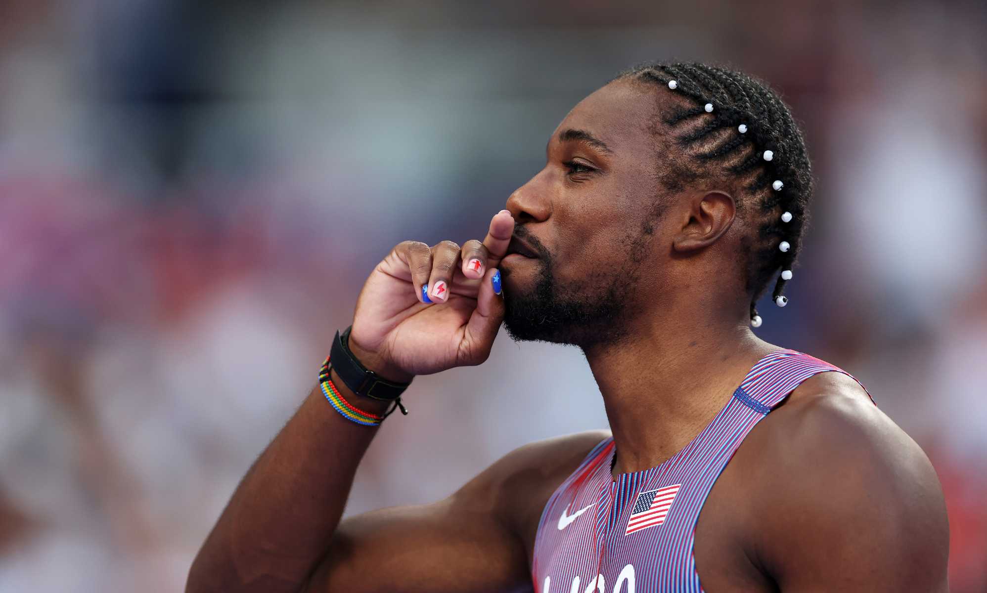 'World's fastest man' Noah Lyles causes a storm by winning Olympic 100m gold with painted nails