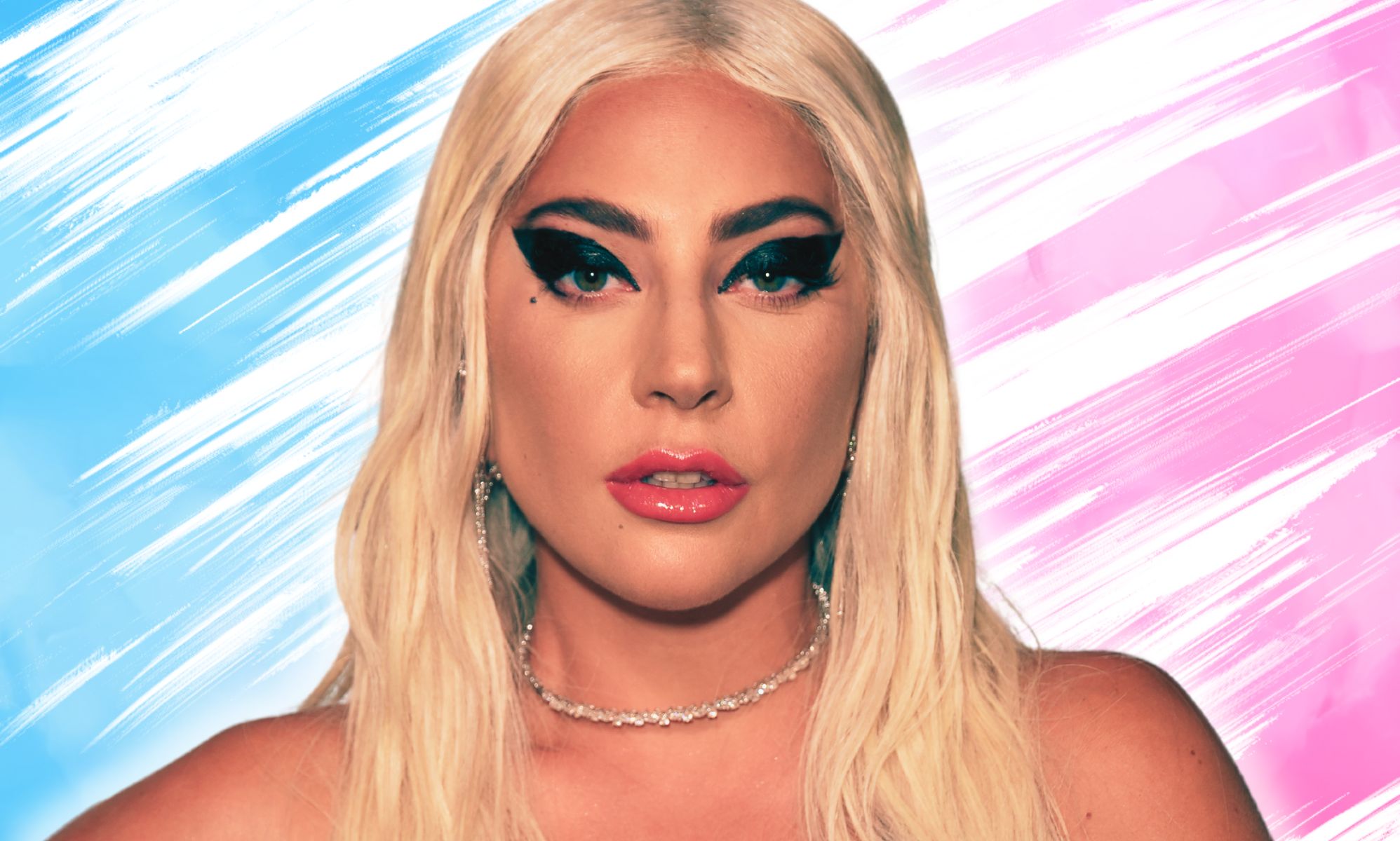 An edited photo of Lady Gaga infront of the colours of the trans flag.