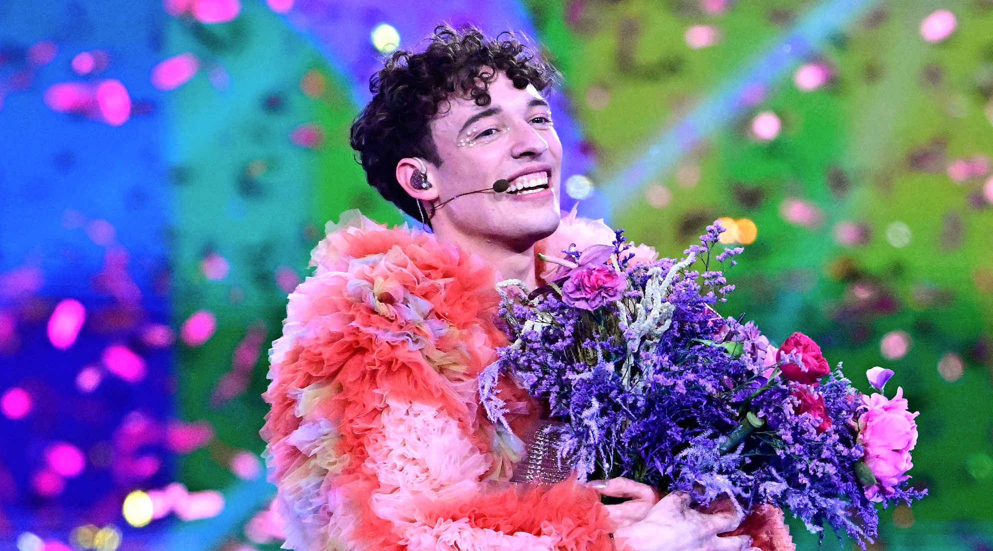 Swiss singer Nemo representing Switzerland with the song &quot;The Code&quot; celebrates on stage after winning the final of the 68th Eurovision Song Contest (ESC) 2024 on May 11, 2024 at the Malmo Arena in Malmo, Sweden. (Photo by Tobias SCHWARZ / AFP)