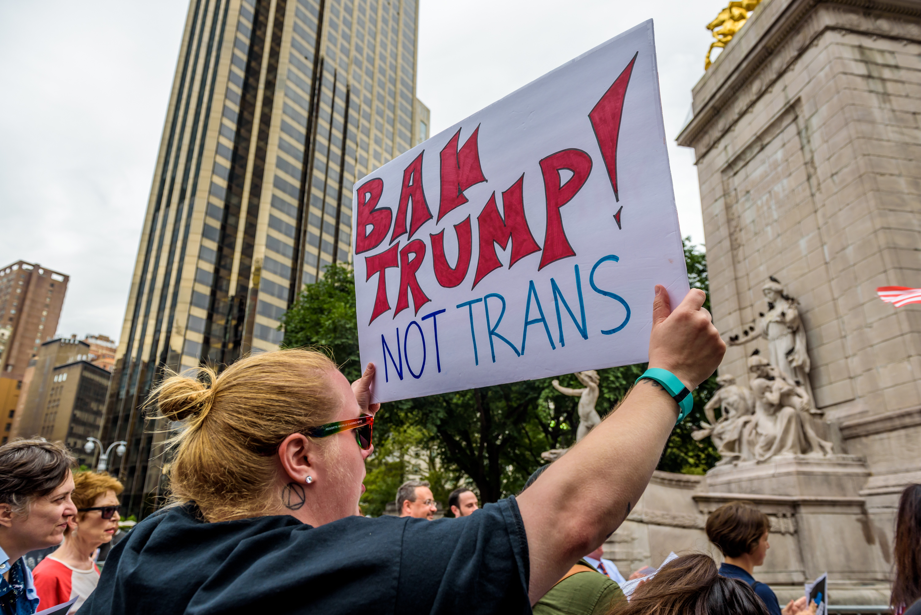 COLUMBUS CIRCLE, NEW YORK, UNITED STATES - 2017/07/29: A group of New Yorkers gathered at Columbus Circle across the Trump International Hotel and Tower New York in Central Park to raise their voices in protest against discrimination towards the LGBT community, in the aftermath of the Trump/Pence regime decision to ban transgender people from serving in the U.S. military. (Photo by Erik McGregor/LightRocket via Getty Images)